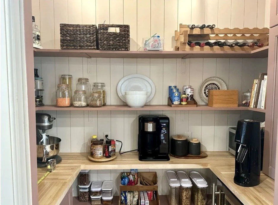 Walk-in pantry with wood shelving in Arlington, VA