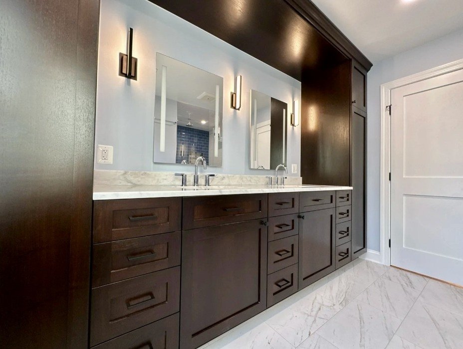Owner's bathroom with vanity sconces and lighted mirrors in Old Town Alexandria.