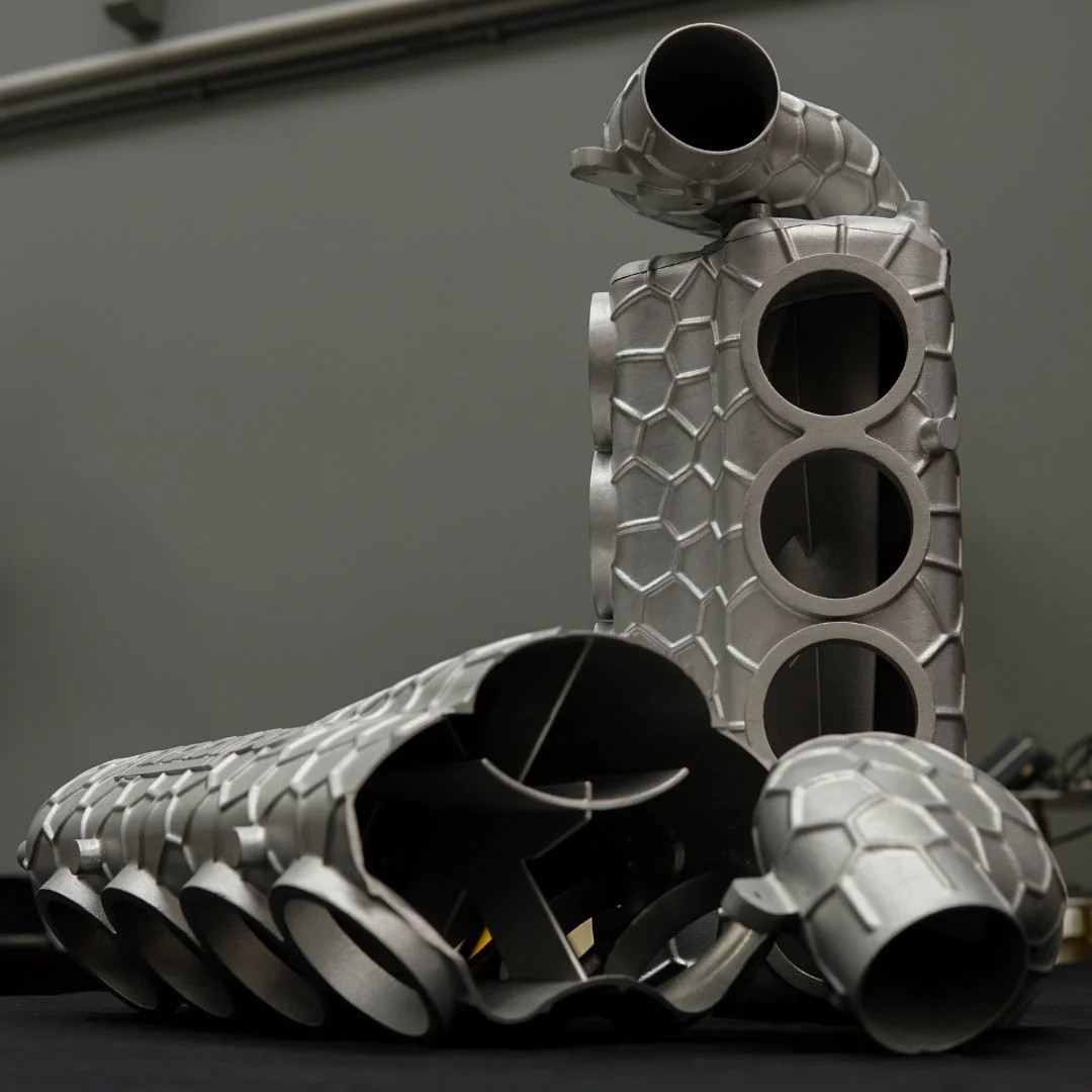 Here are a few shots of our latest 3D-printed airbox parts. These aluminium components were manufactured using Selective Laser Melting (SLM), a cutting-edge additive manufacturing technique that allows for exceptional precision and complex designs.

