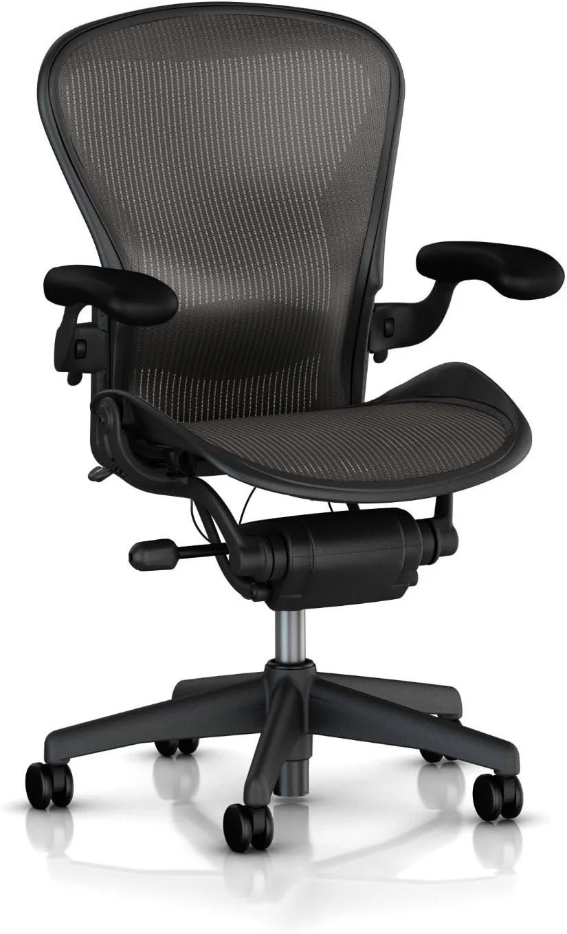 Black Herman Miller Aeron chair against a white background