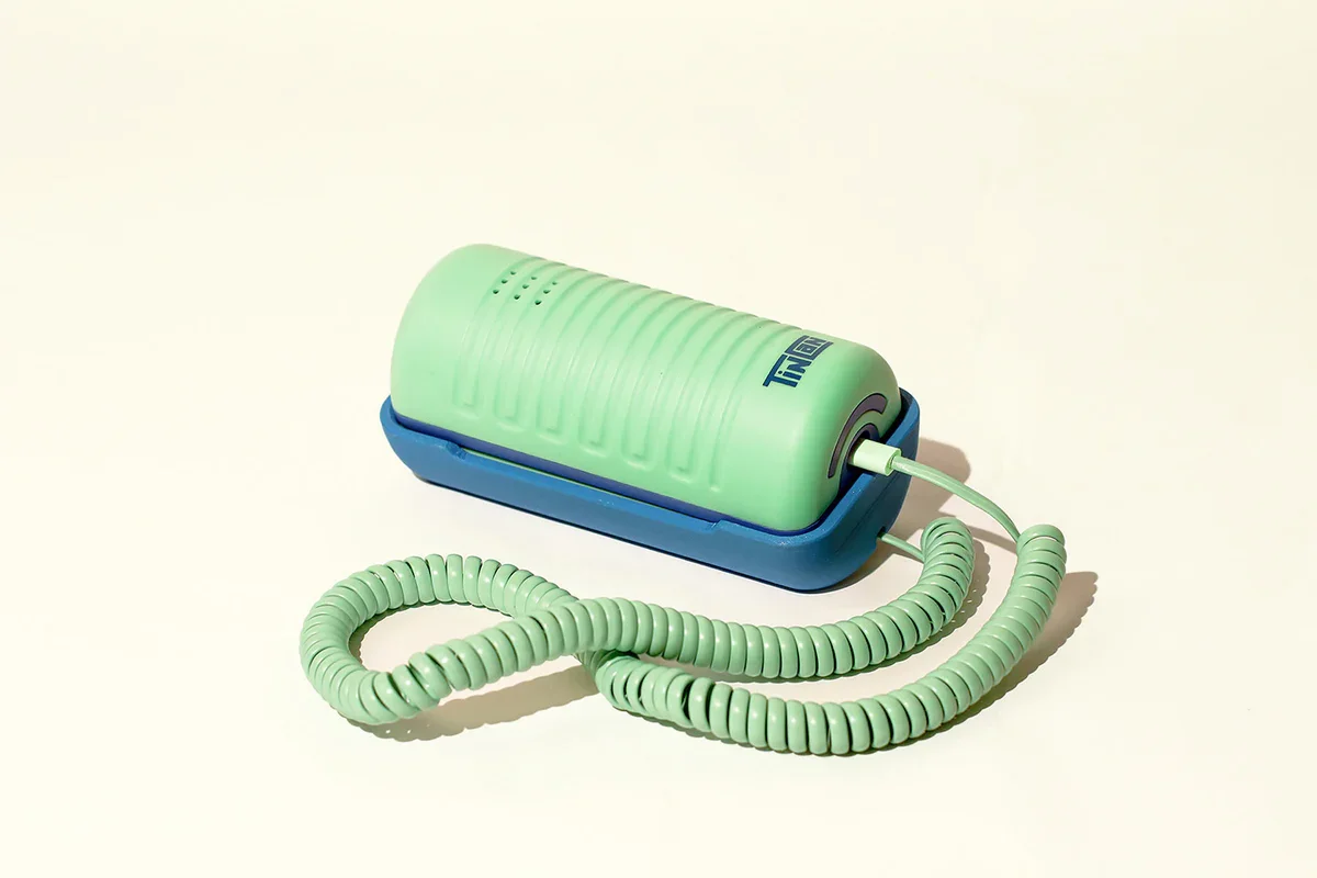 Aqua and blue tin can phone with long spiral cord