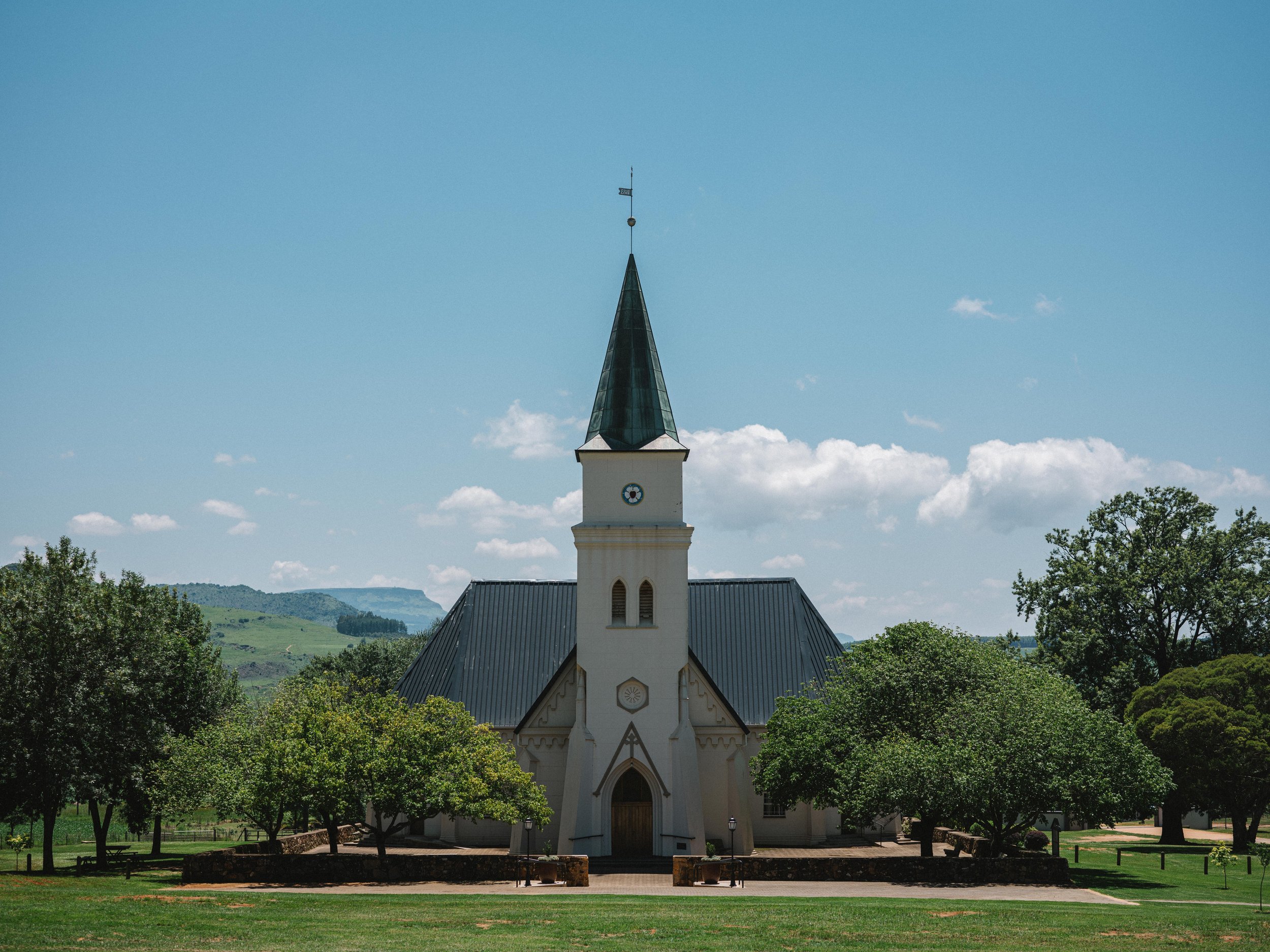 Lüneburg Church, Mpumalanga. The first Springbok Deutsch congregation arrived here in 1854, worshipping in a wooden hut before building this structure. Generations since have been buried in the graveyard behind, with family lines carefully recorded.