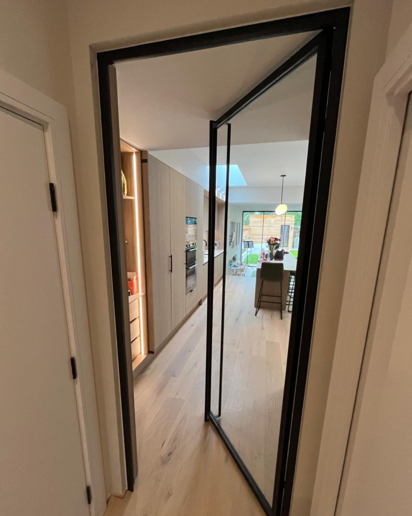 Kitchen Swing Door
Commissioned by Leanne @odp_design "The goal was to create a minimal timeless design with simple detailing which was Intergrated into a single full height handle. The slim frame complements the external glazing package and of