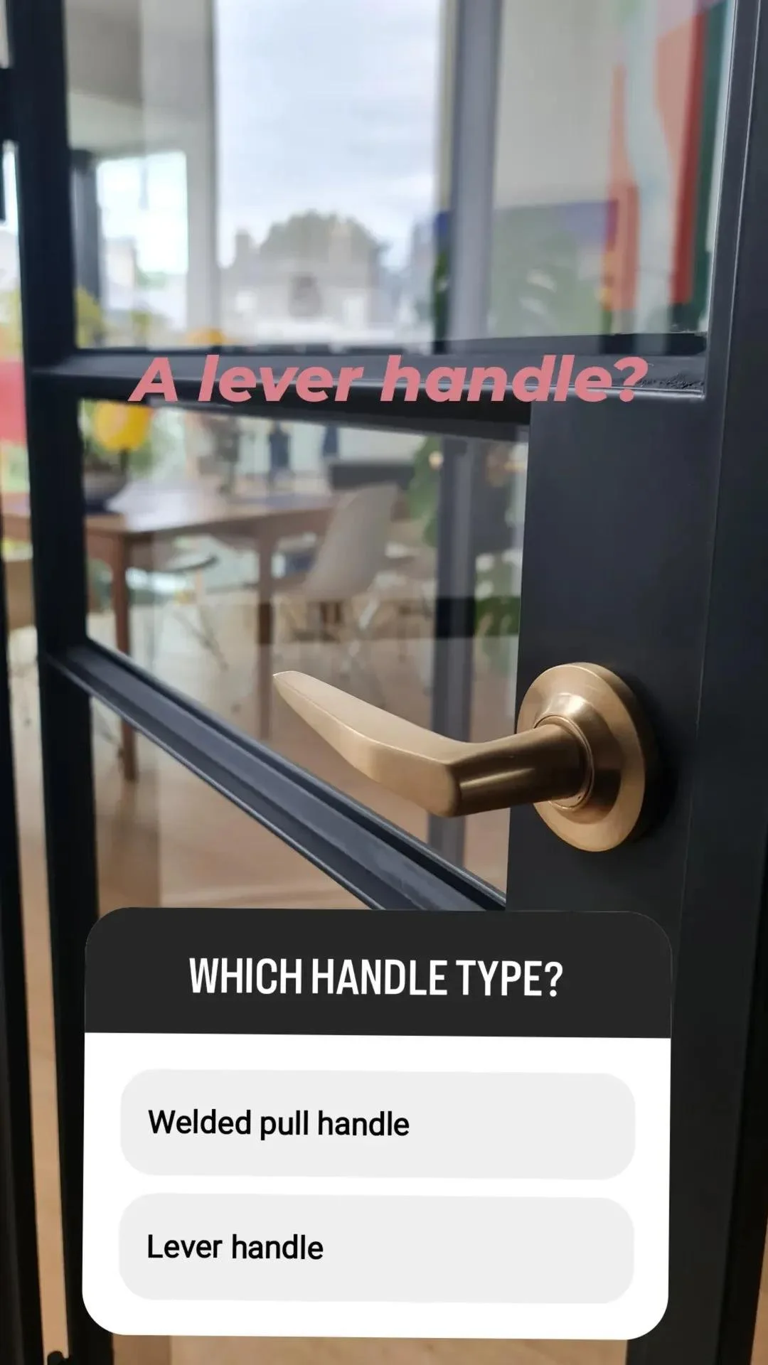 A black door with a metal lever handle. The door has a glass panel with the text 'A lever handle?' and a question asking 'Which handle type?' with options 'Welded pull handle' and 'Lever handle'.