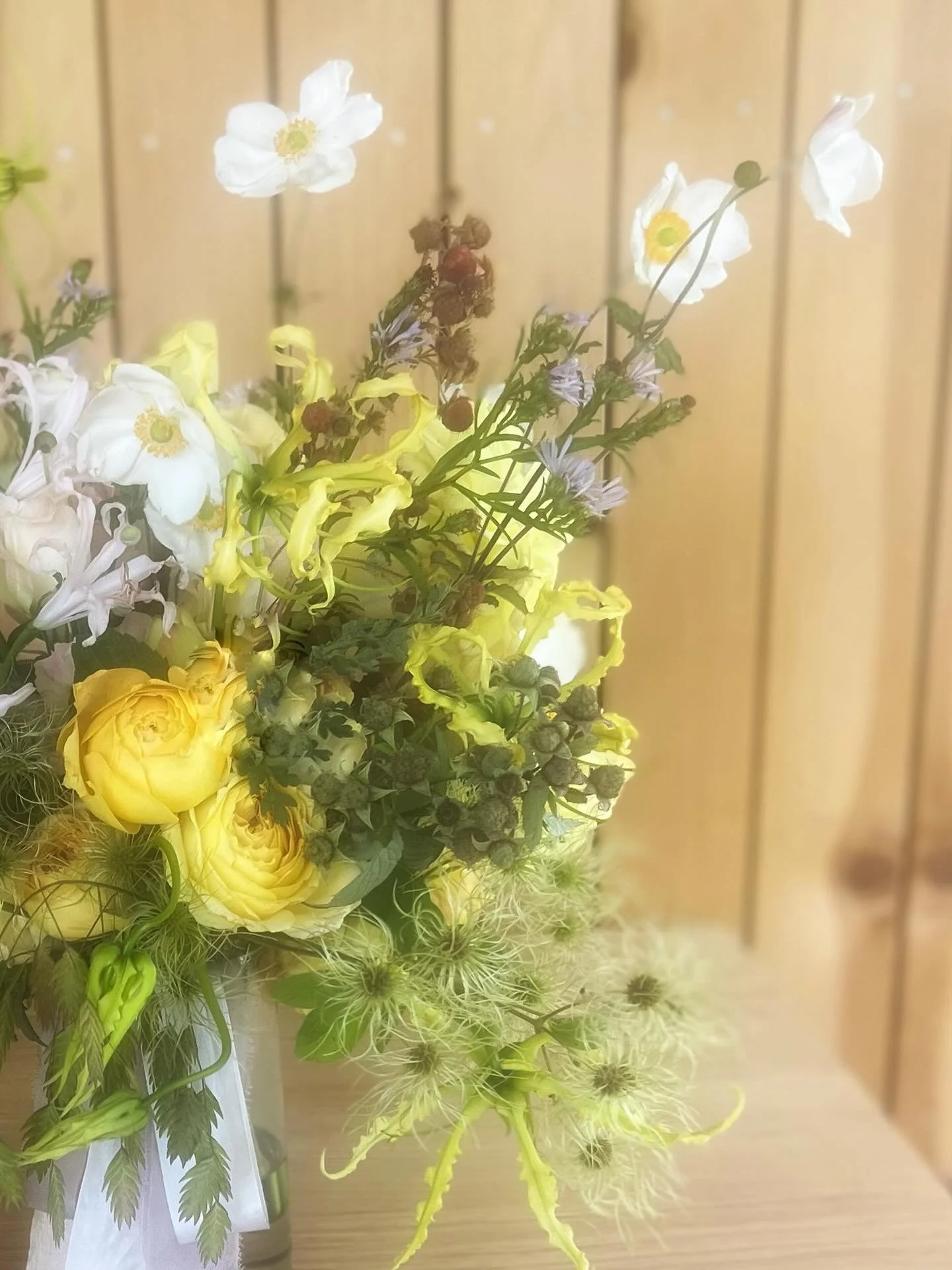 The gentle combination of butter yellow, cream and a small pop of lavender creates a calming palette for any bouquet or wedding floral design.