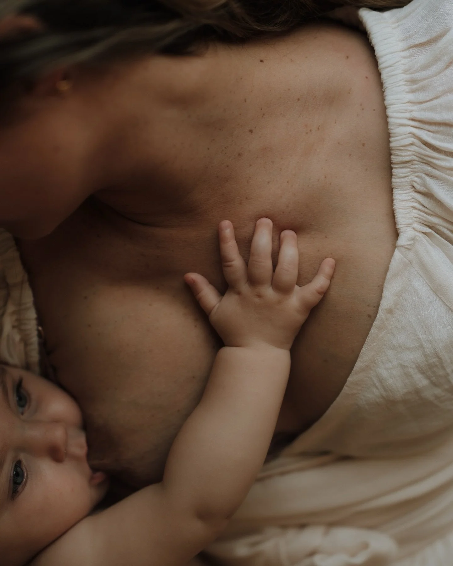 Of folds and fabric and skin on skin, of dancing and milk and a moment with your third baby. A love note. The baby that grew up in the busy home, worlds apart from the quiet of the first time around, an hour for the two of you. 

I have a dedicated m