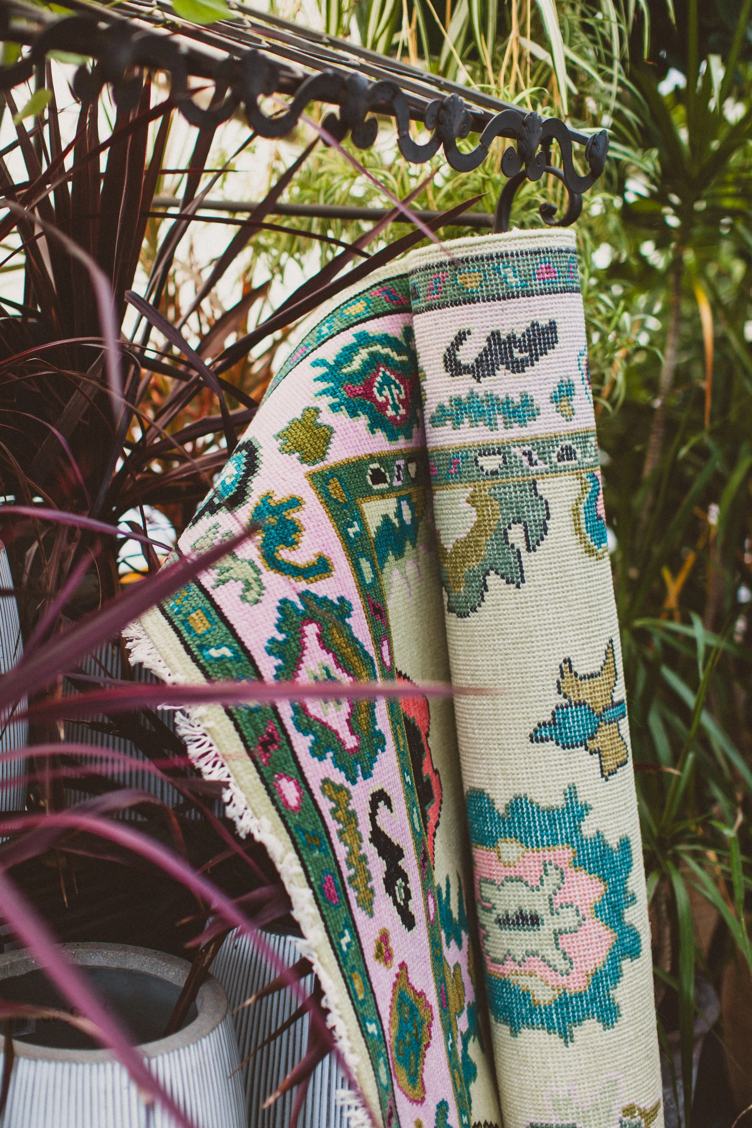 colorful oushak rug in greenhouse
