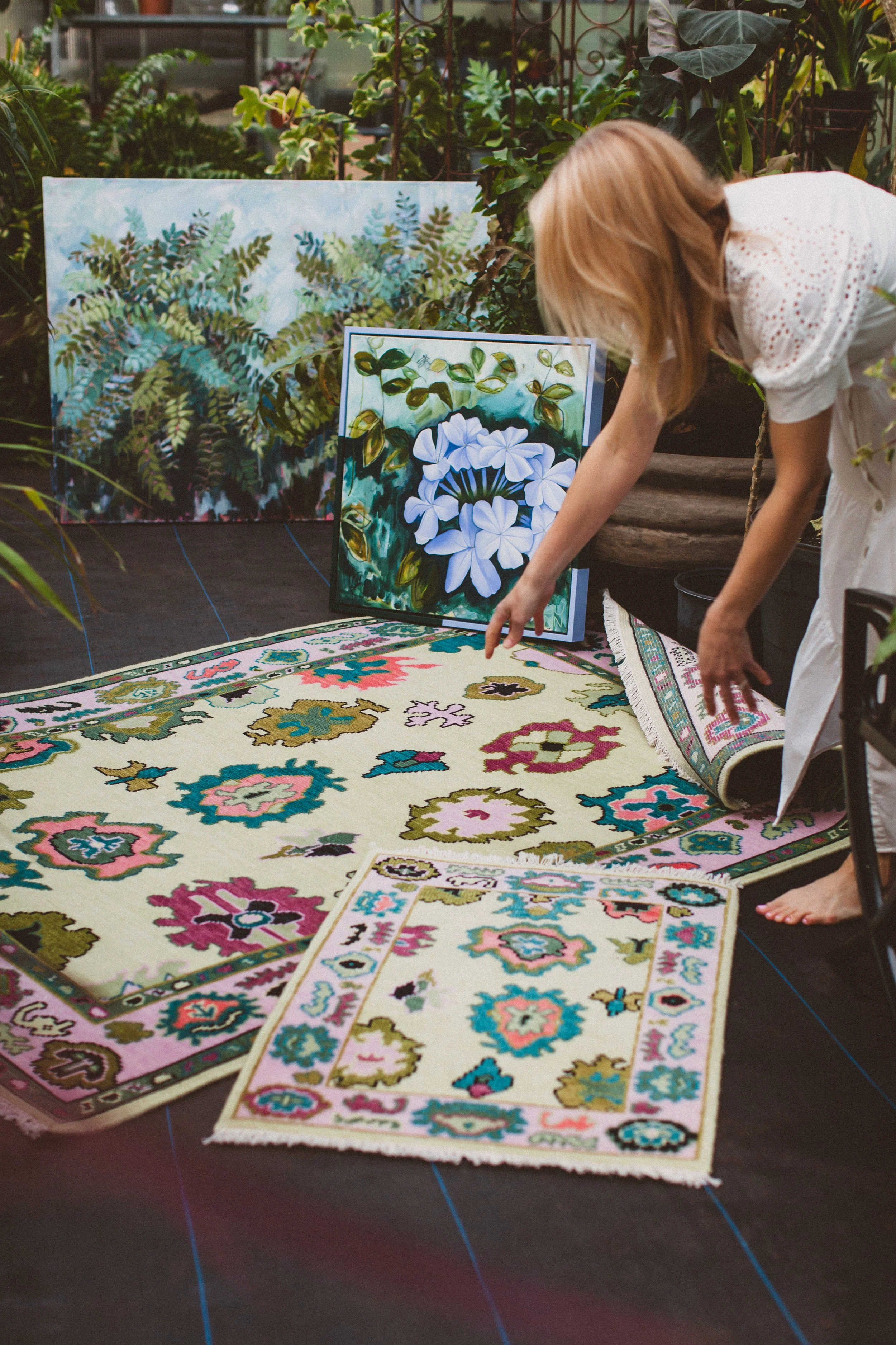 colorful Oushak Rug with art and plants