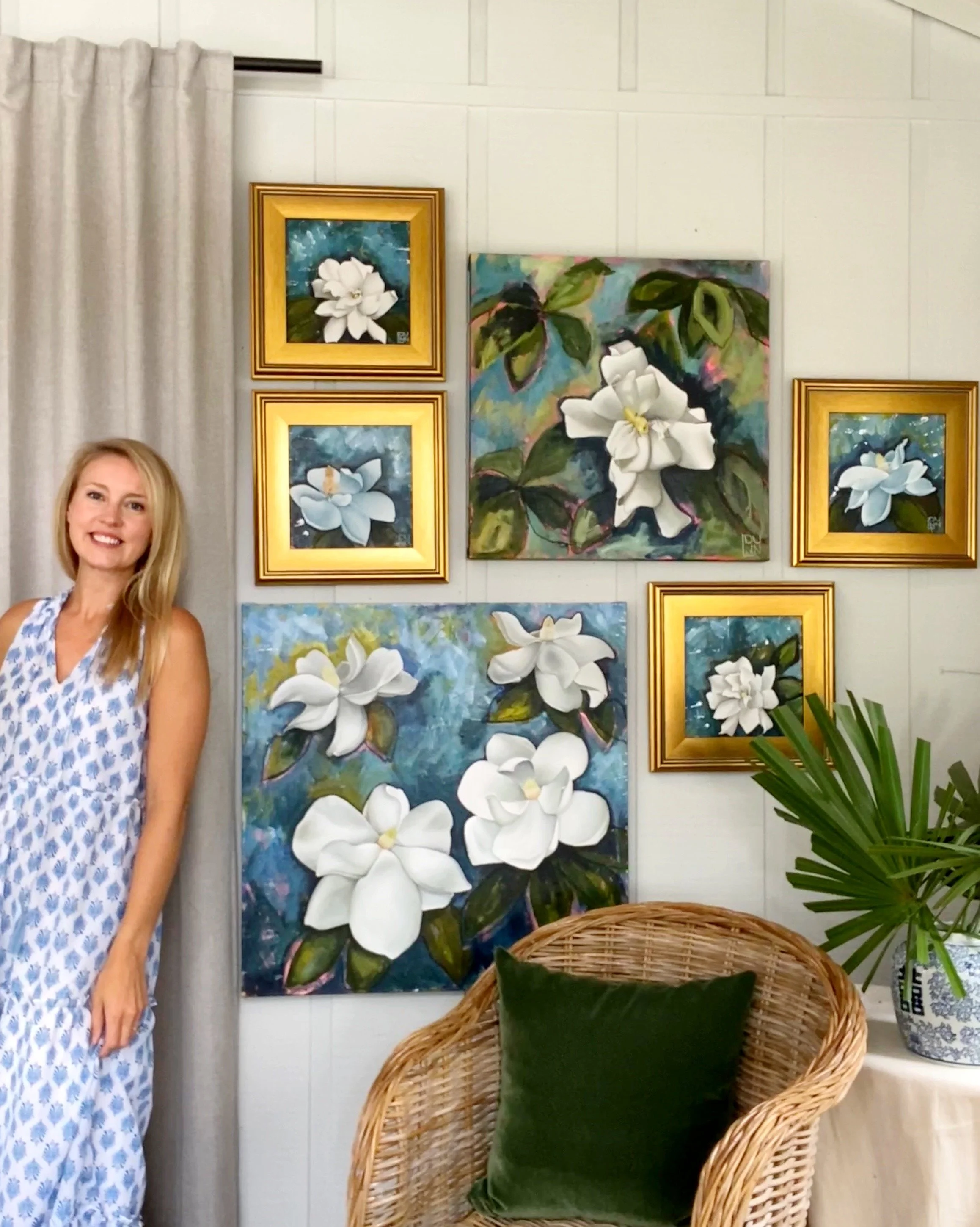 Laura Dunn of mac Lucille in her studio with Magnolia and Gardenia painting collection.