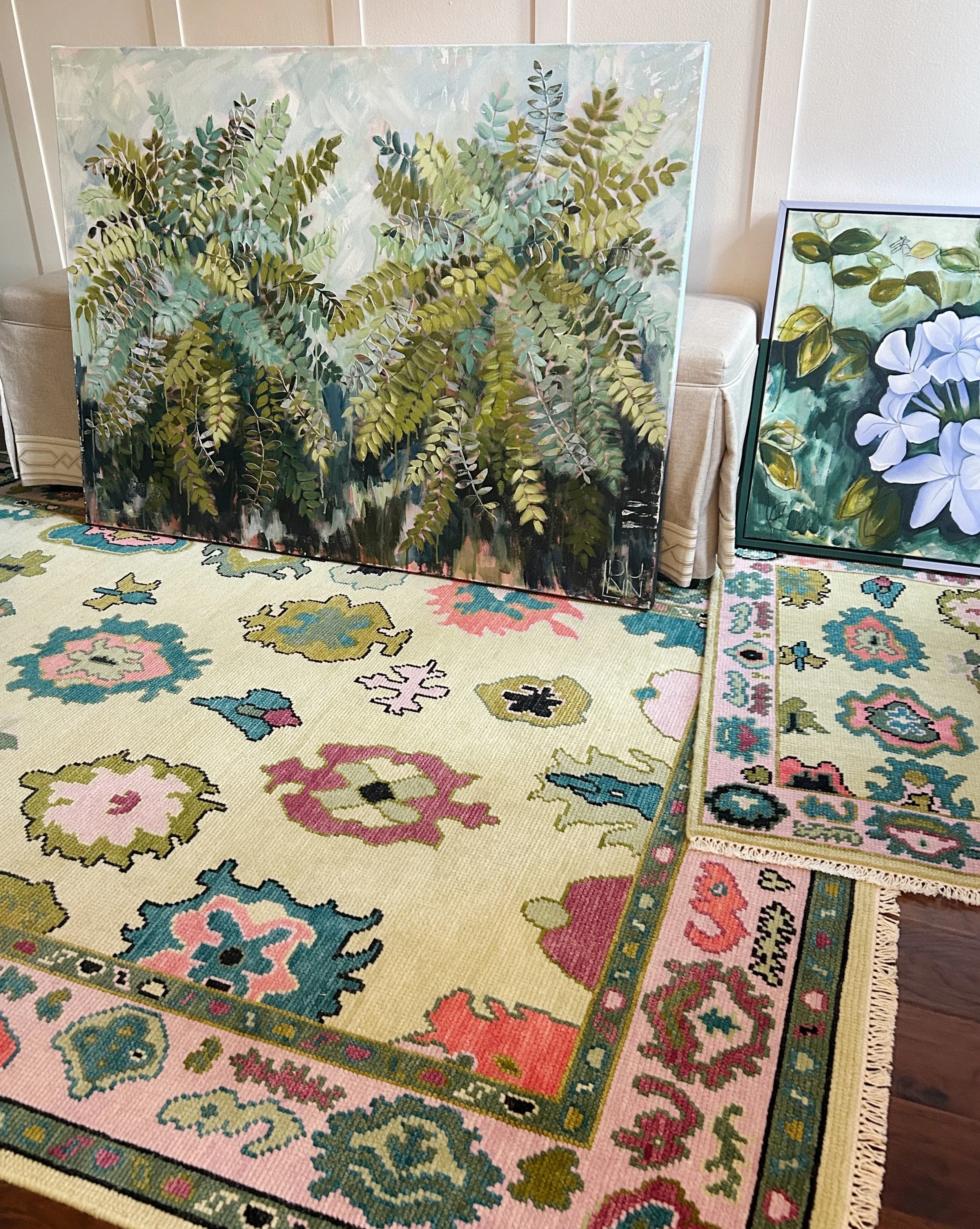 detail of colorful traditional oushak rug with abstract fern painting