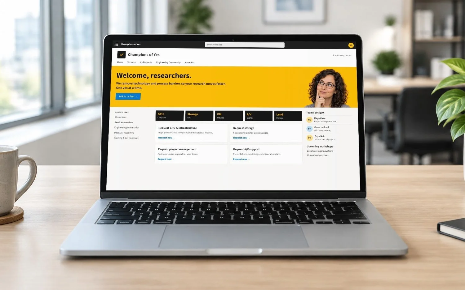 Laptop showing the recreated new intranet home page: Welcome, researchers. We remove technology and process barriers so your research moves faster.