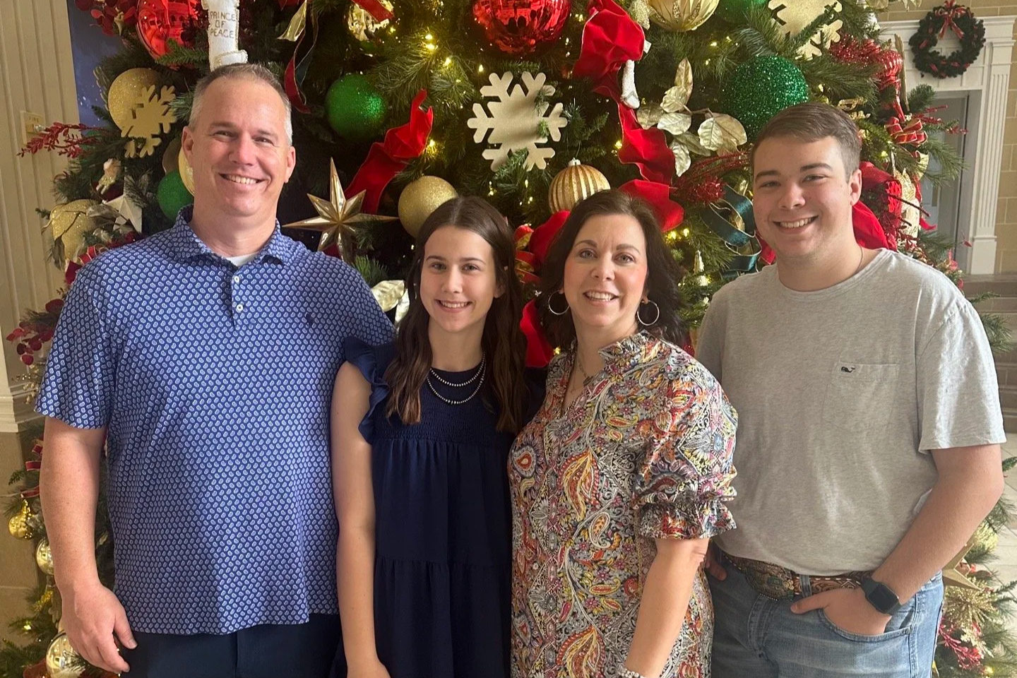 Paul, Michelle, and Ellee Bischof and Levi Risner