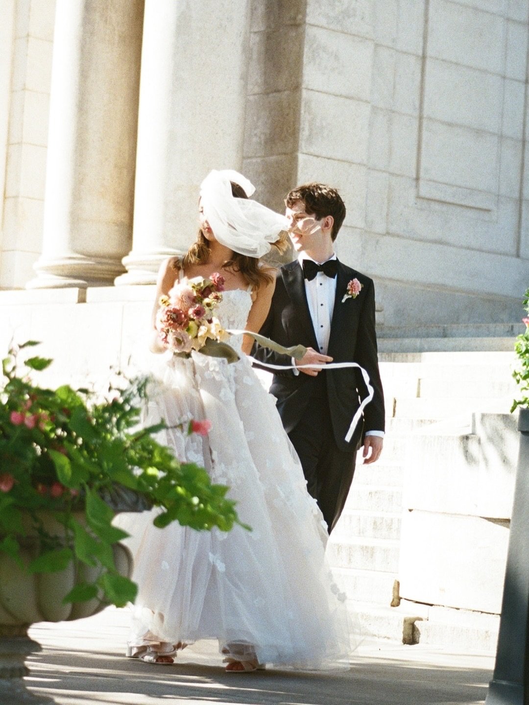 Film photos as fine art for Angela + Chris&rsquo;s charming wedding day in Minneapolis.
⠀⠀⠀⠀⠀⠀⠀⠀⠀
There were a lot (a LOT) of things I loved about this wedding &mdash; the grand architecture, the floral designs, the super chipper and laidback attitud