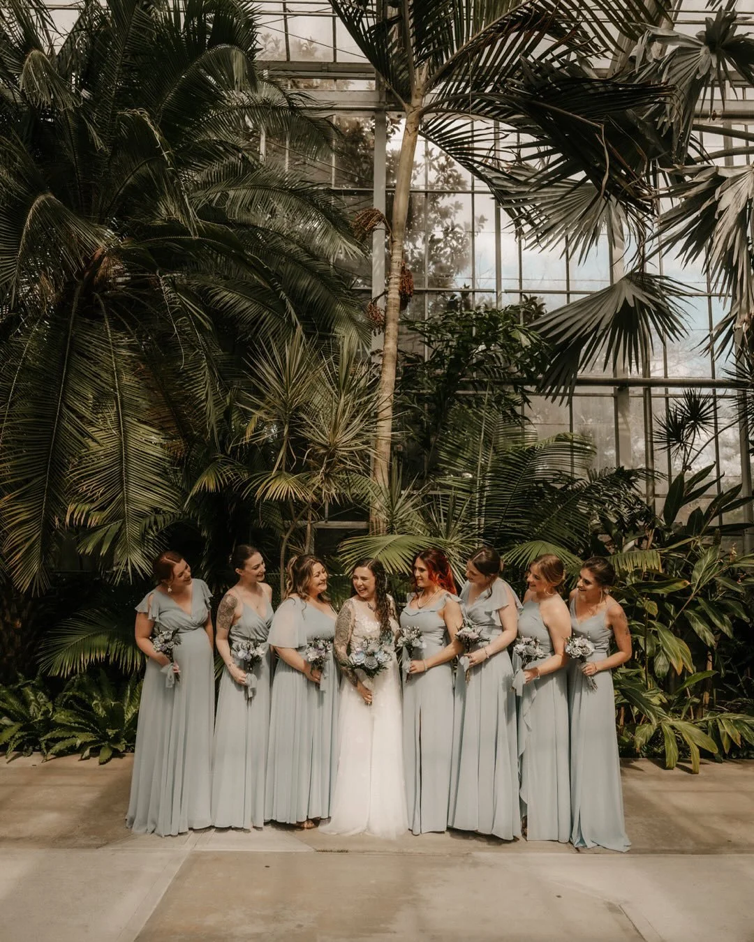 Brenna &amp; Eli&rsquo;s whimsical greenhouse wedding at the Roger Williams Botanical Center 🪴

Venue: @rwpbotanicalcenter 
Planner: @cosebellaevents 
Photo &amp; Video: @talesofsonder 
Dress: @spinabride 
Florals &amp; Design Details: @brennaguay @