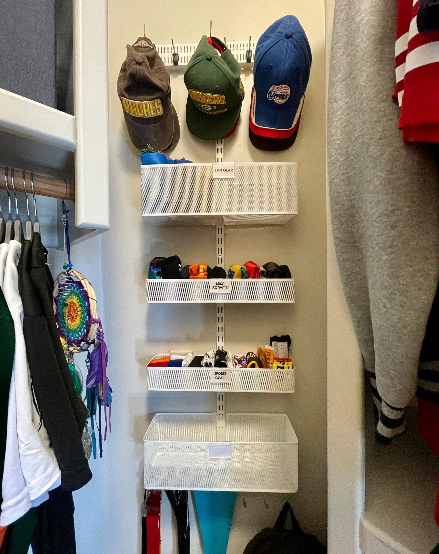 Elevate your organization game with the power of vertical space! Tight corners and awkward spots? No problem! The Elfa wall mounted system was the perfect solution to transform this cramped closet corner and utilize the vertical space to its fullest 