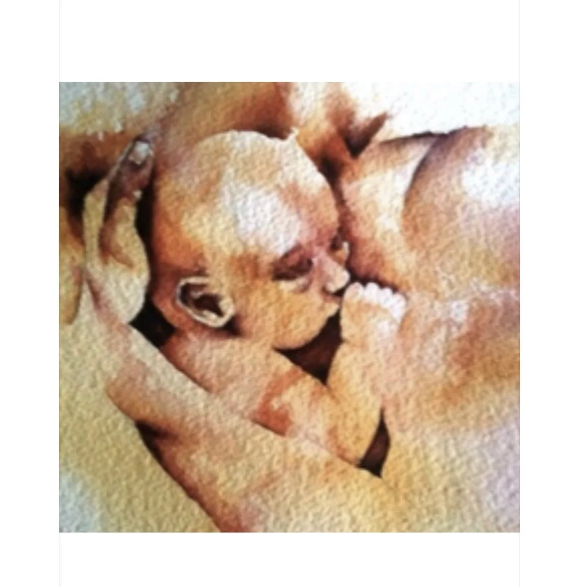 Close-up of a newborn baby and an adult face to face,