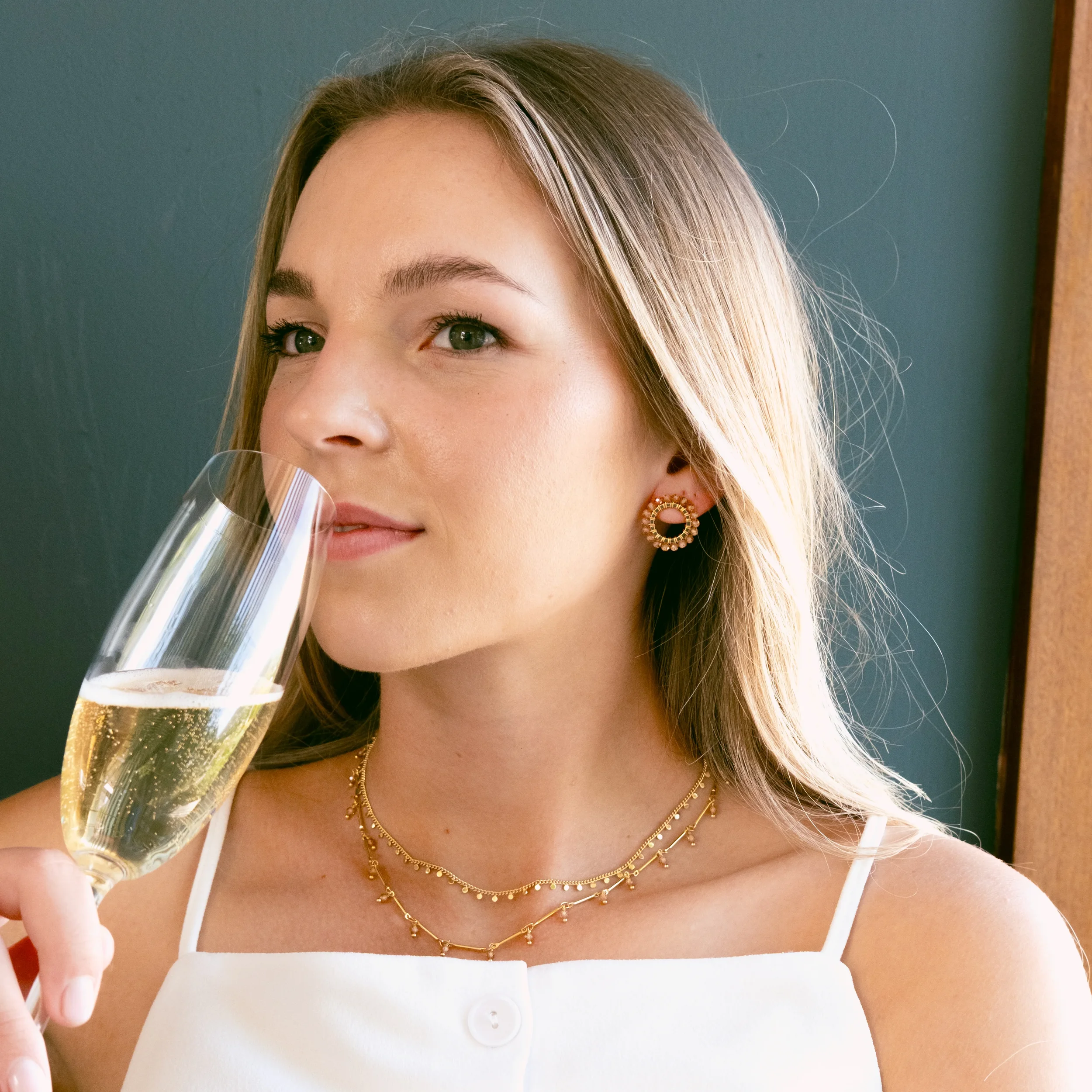 Champagne Stud Earring model.webp