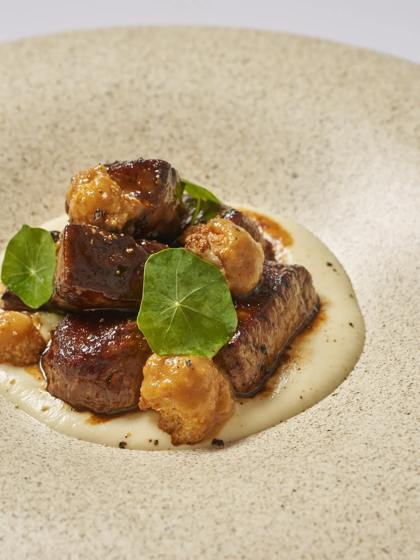 Black garlic, cauliflower, and a perfectly seared tenderloin &mdash; familiar flavors, Naro&rsquo;s way.

#Naro #NaroNYC