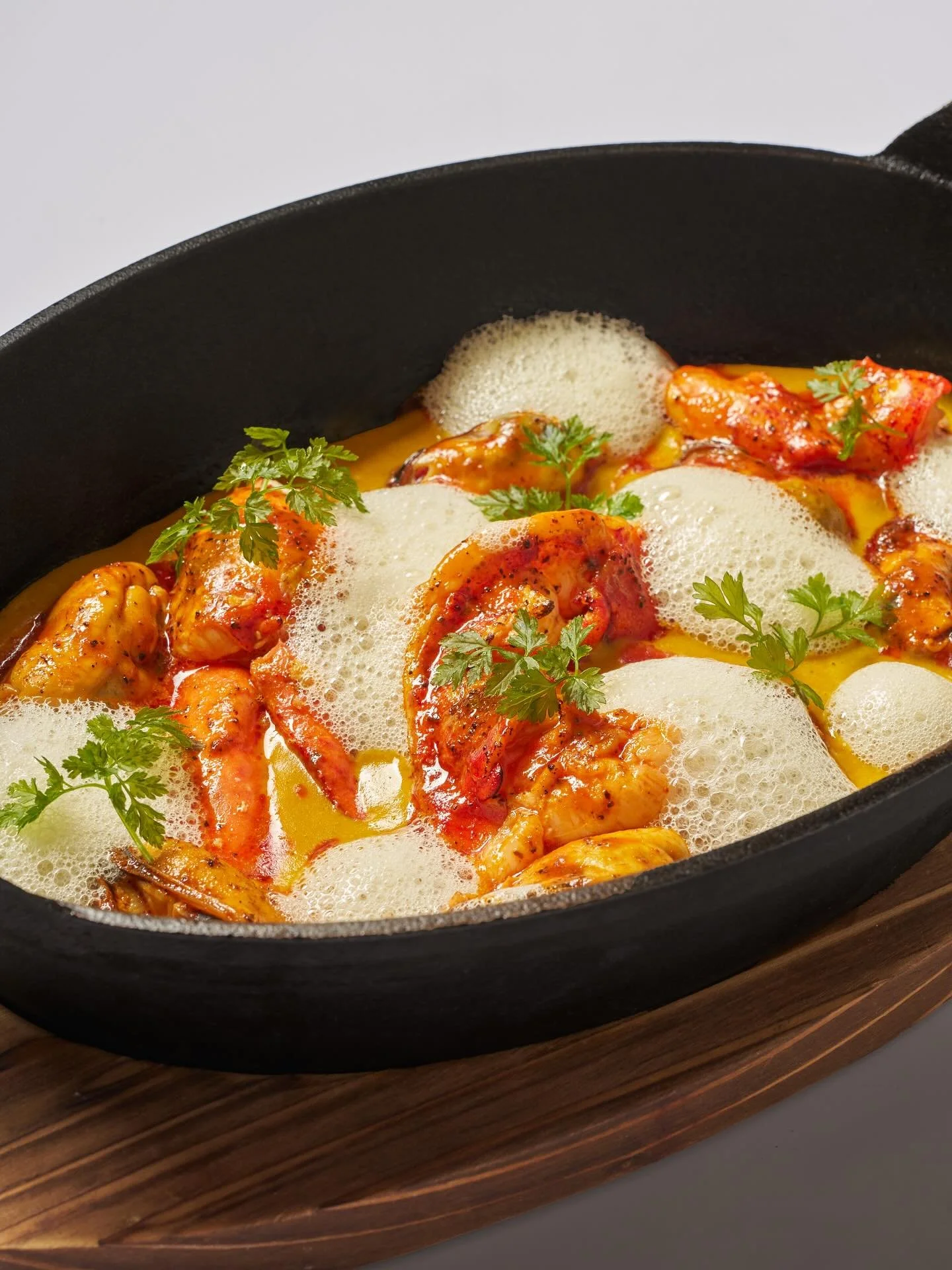 Smoky grilled lobster, gochugaru glaze, sweet potato curry, and light lobster foam &mdash; warm flavors, simply done. 🦞❤️

#Naro #NaroNYC