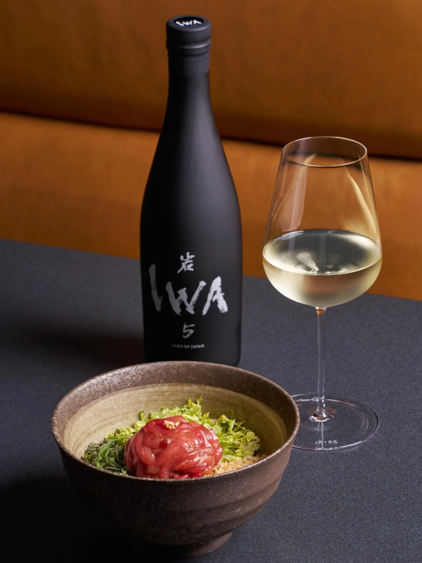 Our bluefin tuna bibimbap is a modern take on a classic Korean dish that highlights harmony and balance. This dish&rsquo;s purpose lies in the creation of the whole from the individual, a reflection of the IWA 5 philosophy. When paired with IWA 5 - A