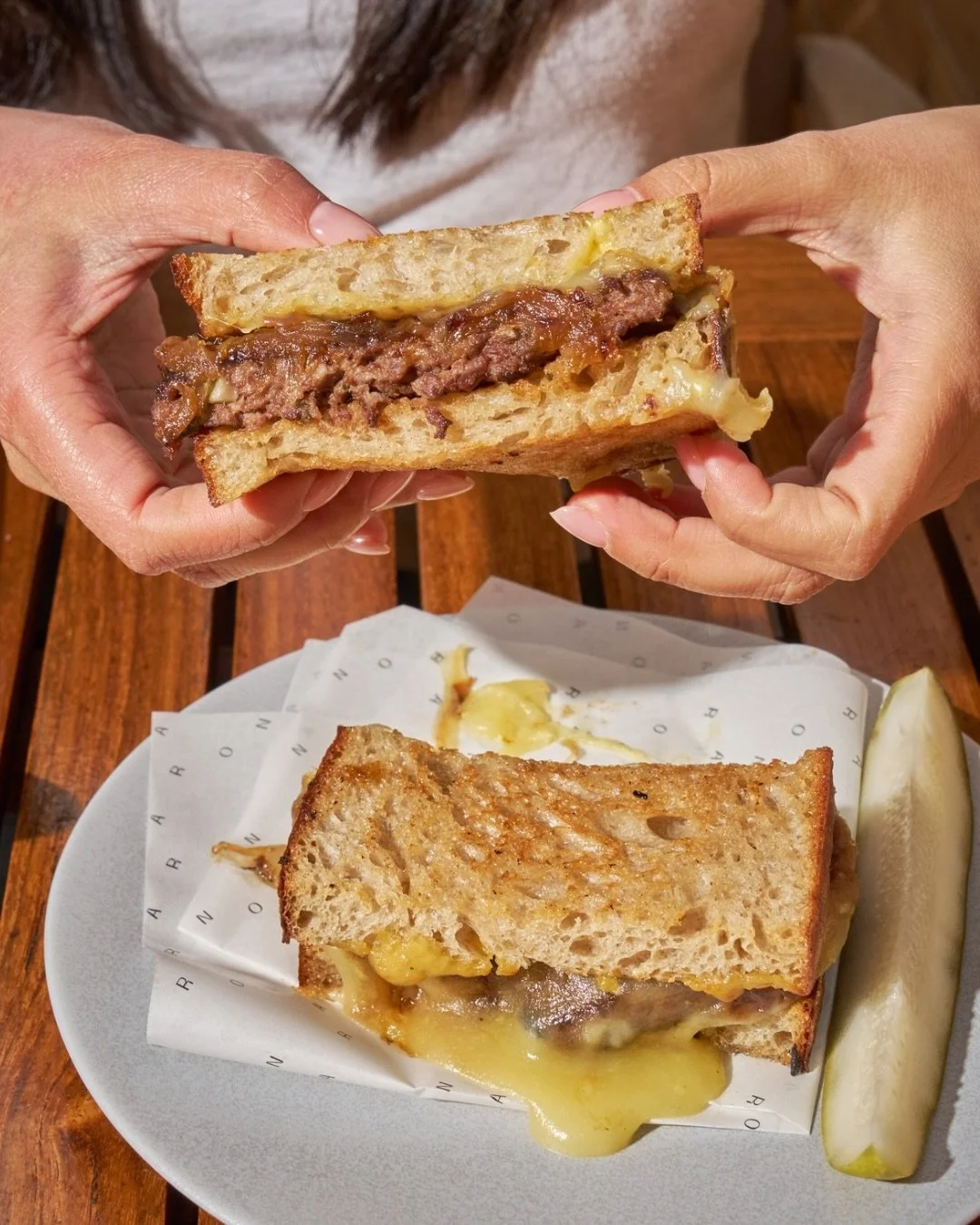 Melt your cravings away with our new NARO Wagyu Cheese Melt 🧀

Wagyu beef patty, sweet caramelized onions, dijonnaise, and melted cheddar cheese, everything you could want in a sandwich.

Pair it with a cold beer during happy hour, then spend the re