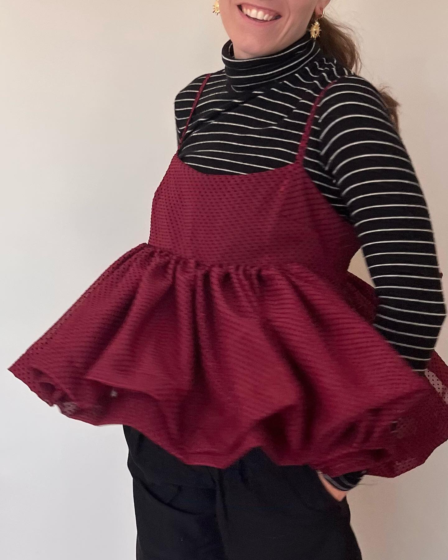 Holiday Moody tank 🎁🤍🥰

Another one-of-a-kind made from secondhand fabric that&rsquo;s sparkly, sheer, and ruby red with black velvet polka dots 🫶

This one&rsquo;s fully lined - so there are two layers of gathered fabric giving it lots of volume