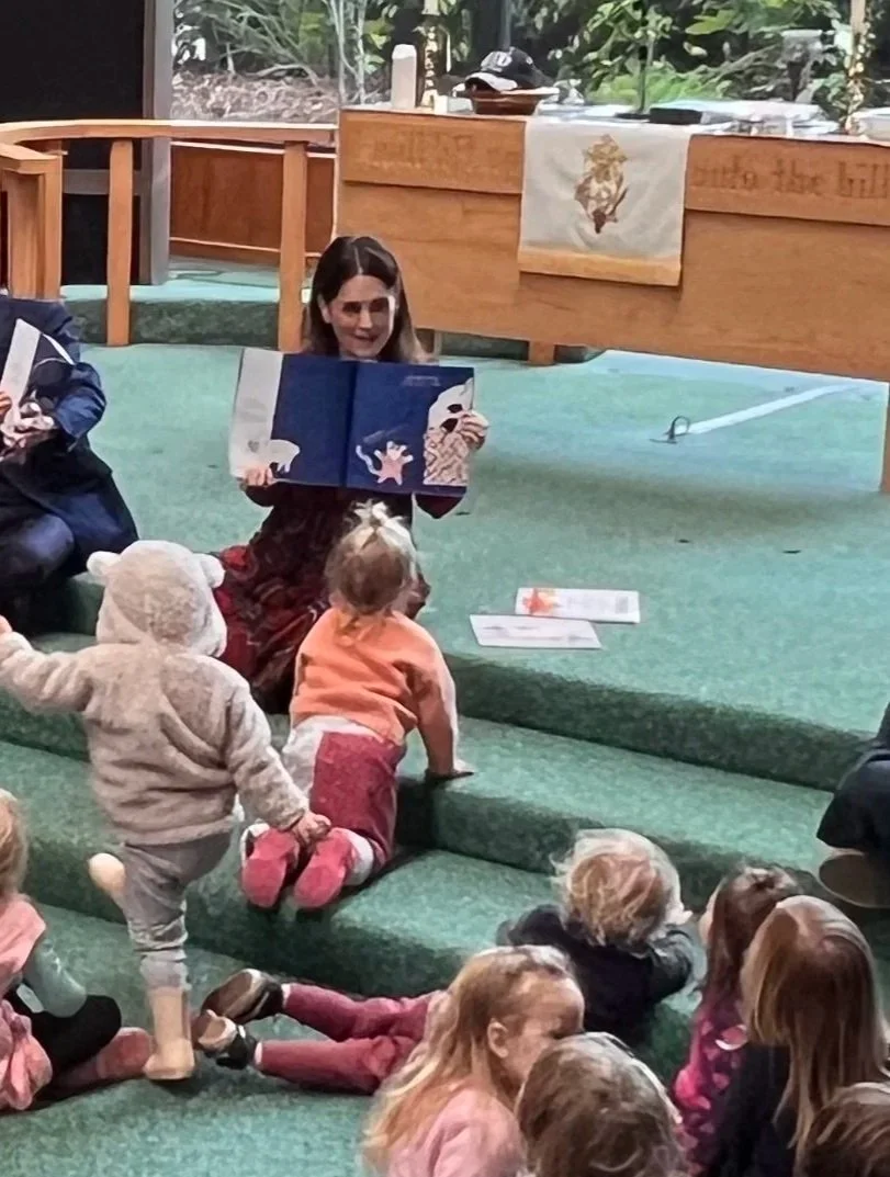 Rachel Lang volunteering to read to pre-schoolers for literacy awareness