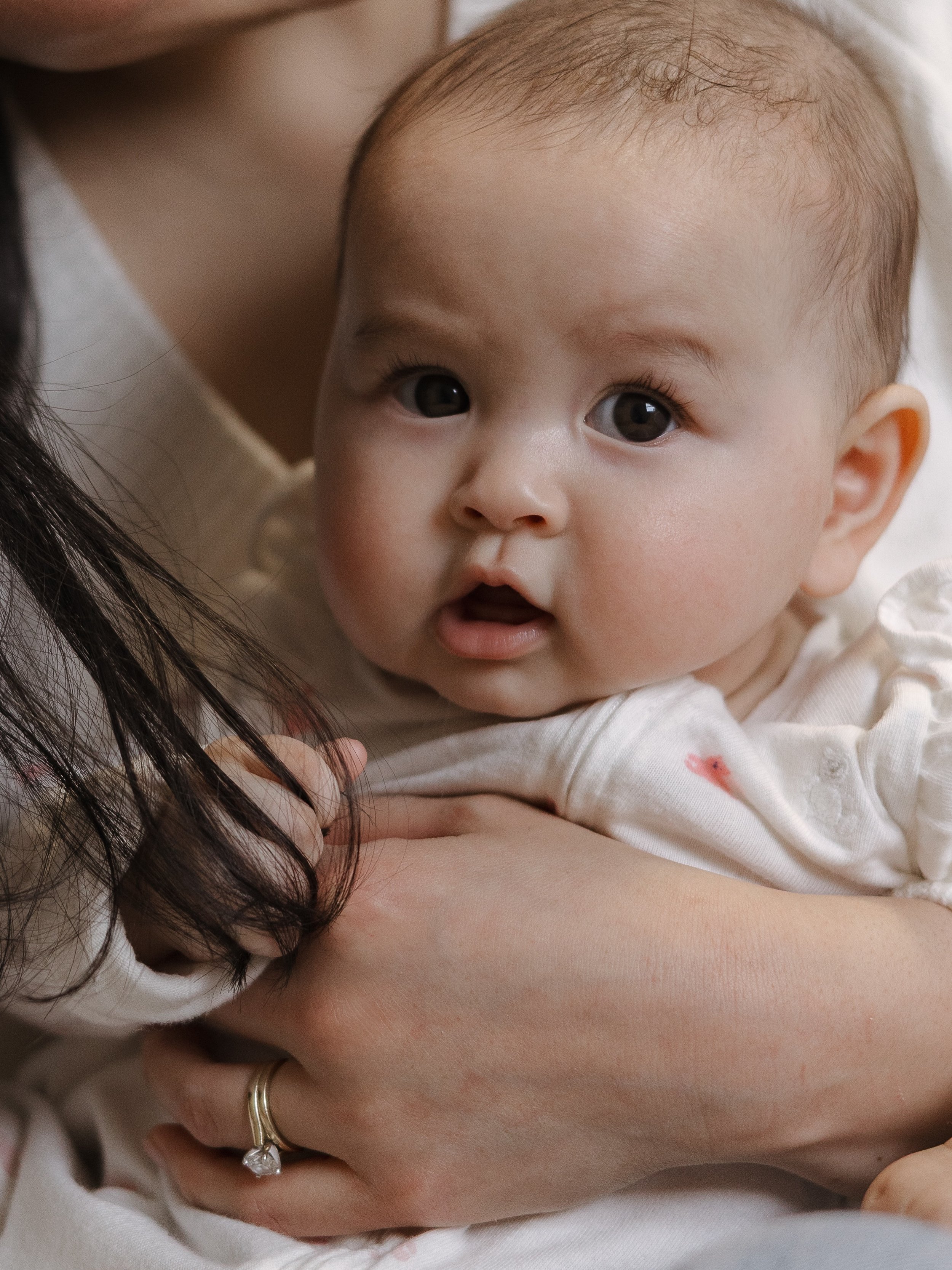 This at home session was truly such a warm hug - from cozy baby sleepers and storytime to warm cups of coffee and guitar jams.   This is the reason I love at home storytelling family sessions so much, they are full of everything YOU. Your home, your 