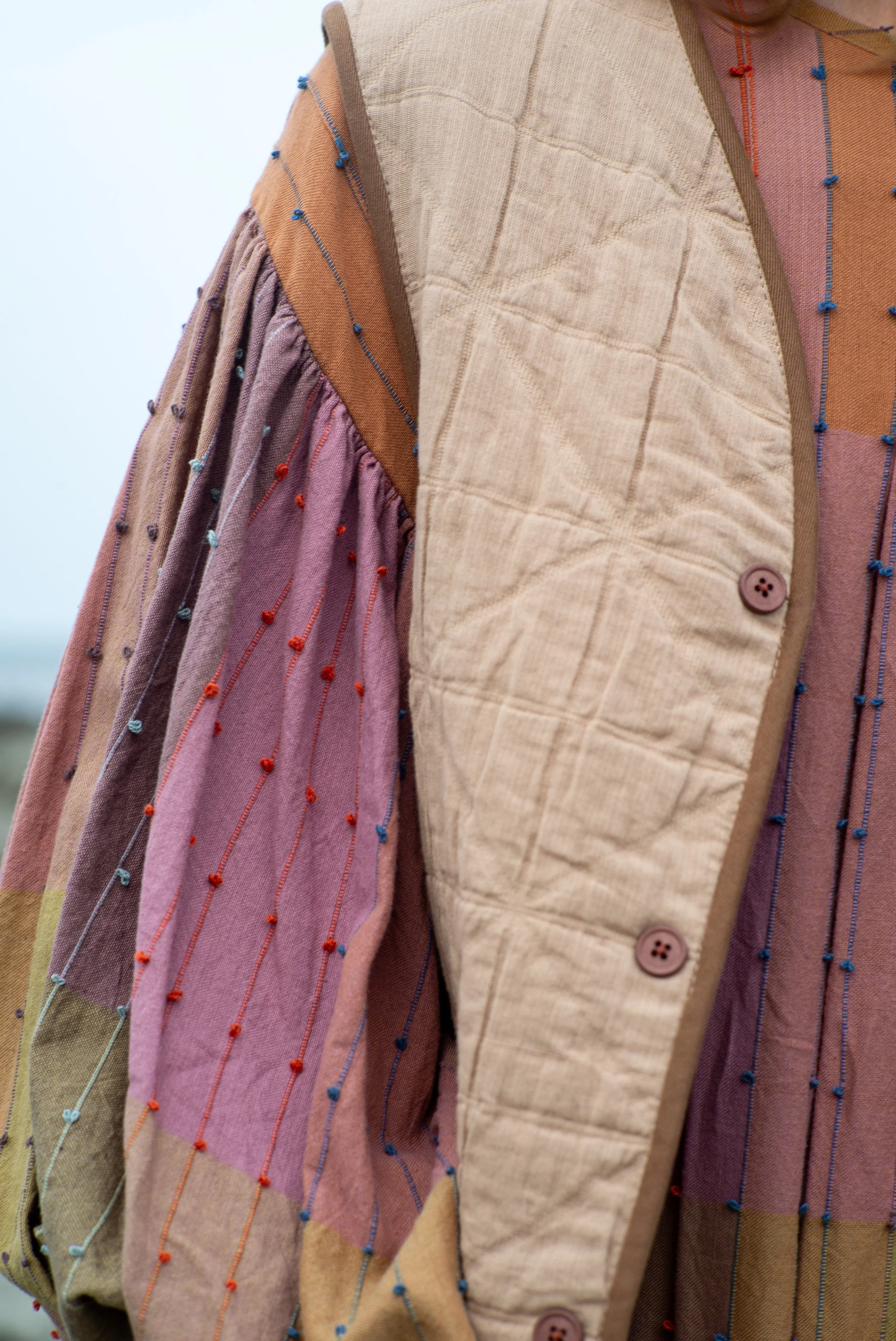 ORLA REVERSIBLE VEST | NUDE & CHARCOAL