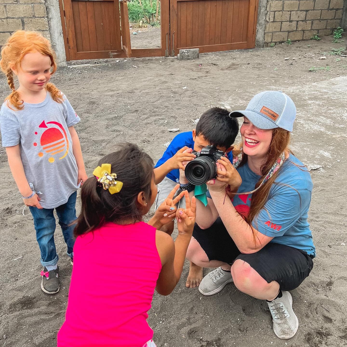 The school children were so curious about our photographer&rsquo;s camera! Every time they&rsquo;d see her with it they&rsquo;d practically knock her over trying to get a look! They wanted to take turns taking pictures and posing up close to the came