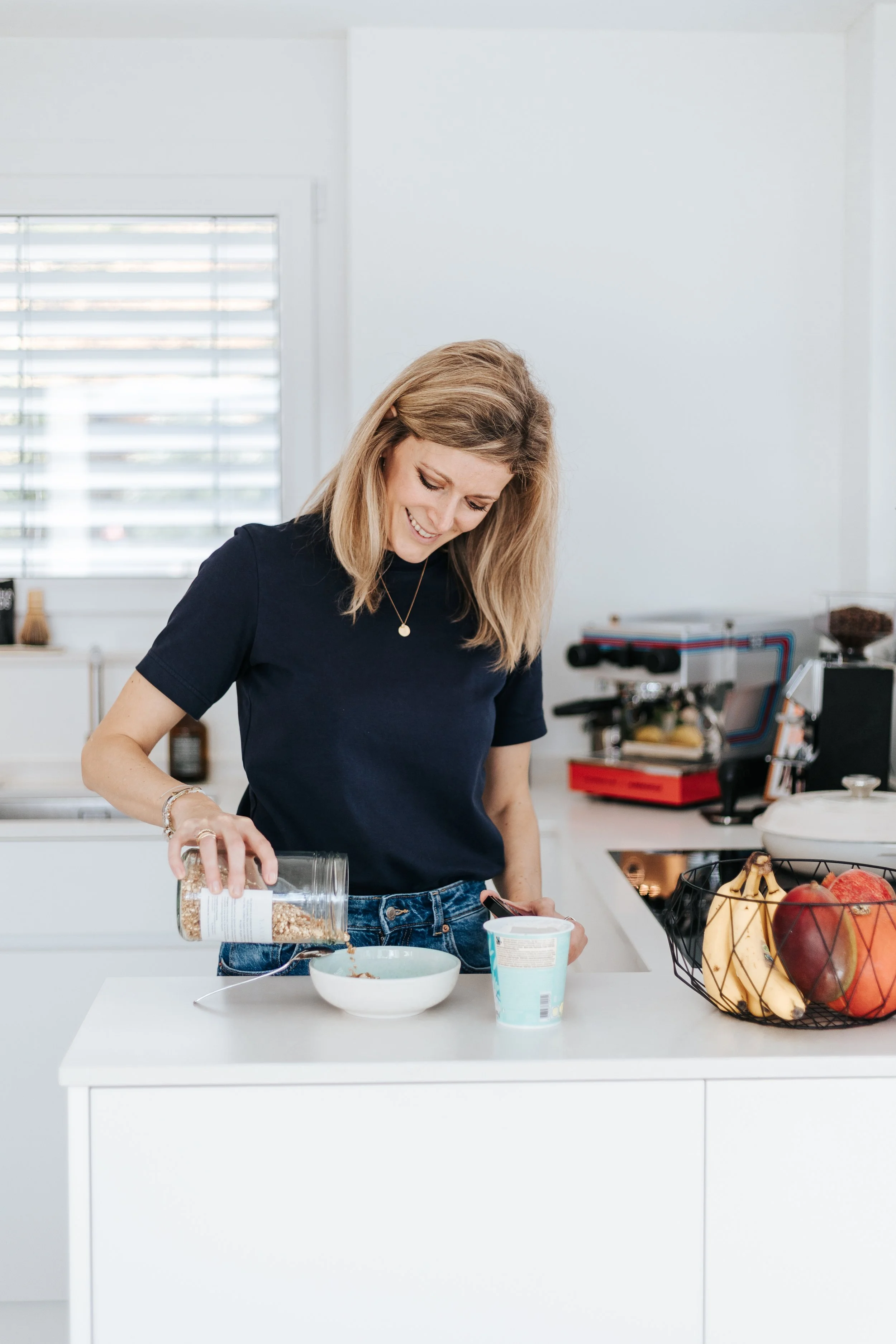 Lifestyle concierge for familys wellbeing preparing granola for breakfast