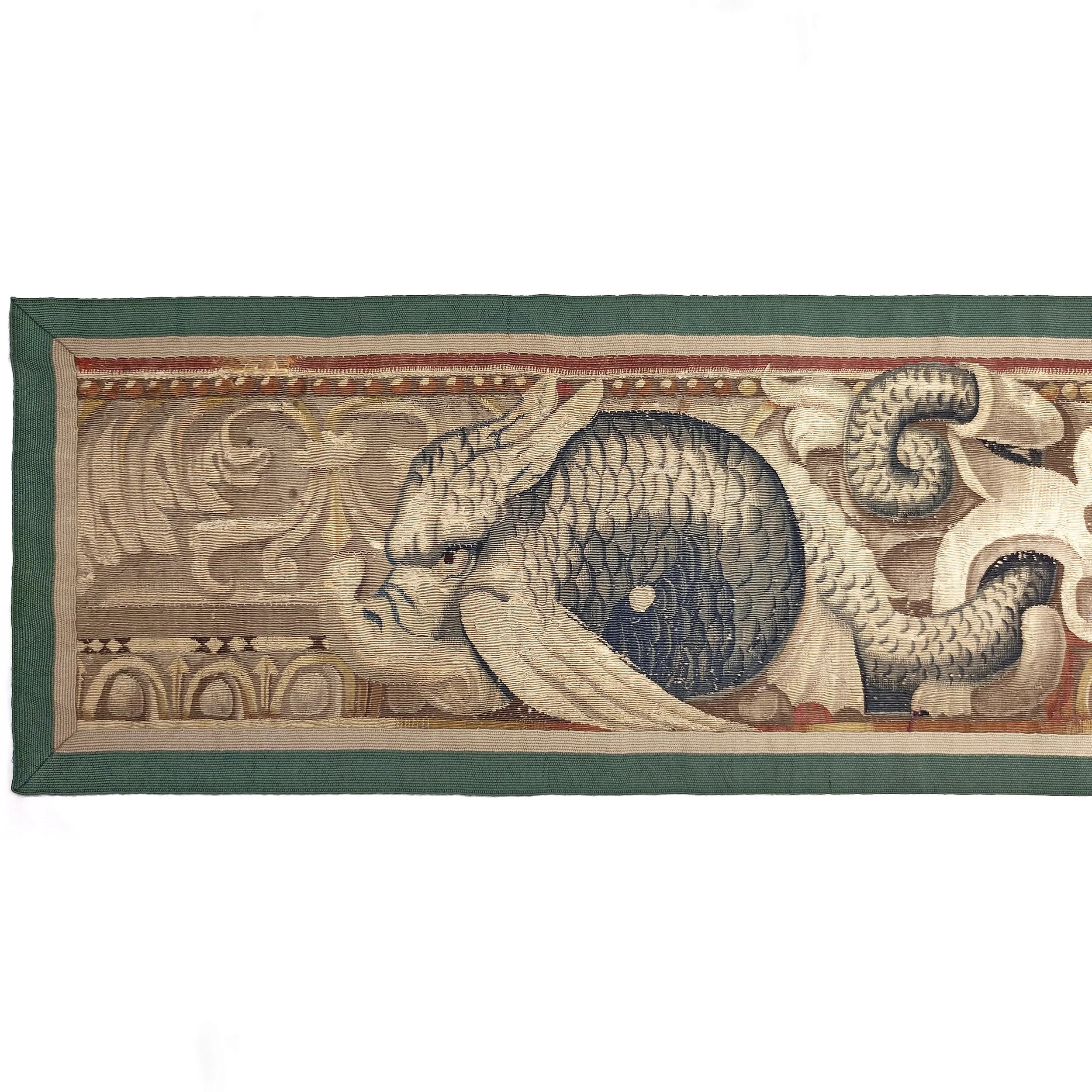 Tapestry Brussels 17th century border lion and dolphins 4.jpg