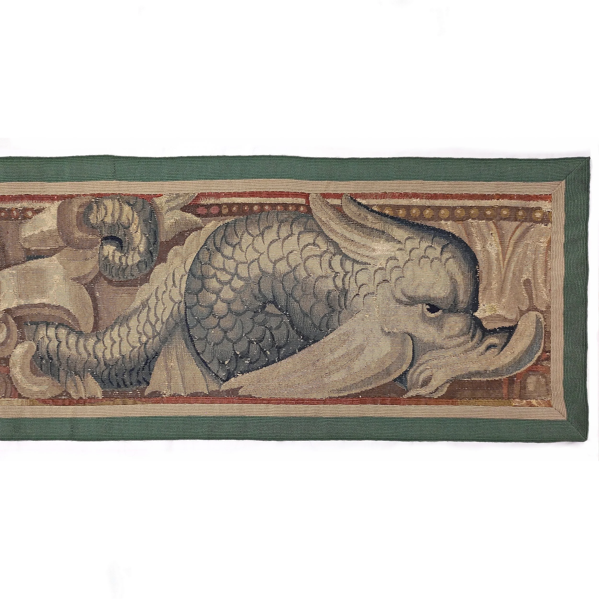 Tapestry Brussels 17th century border lion and dolphins 2.jpg