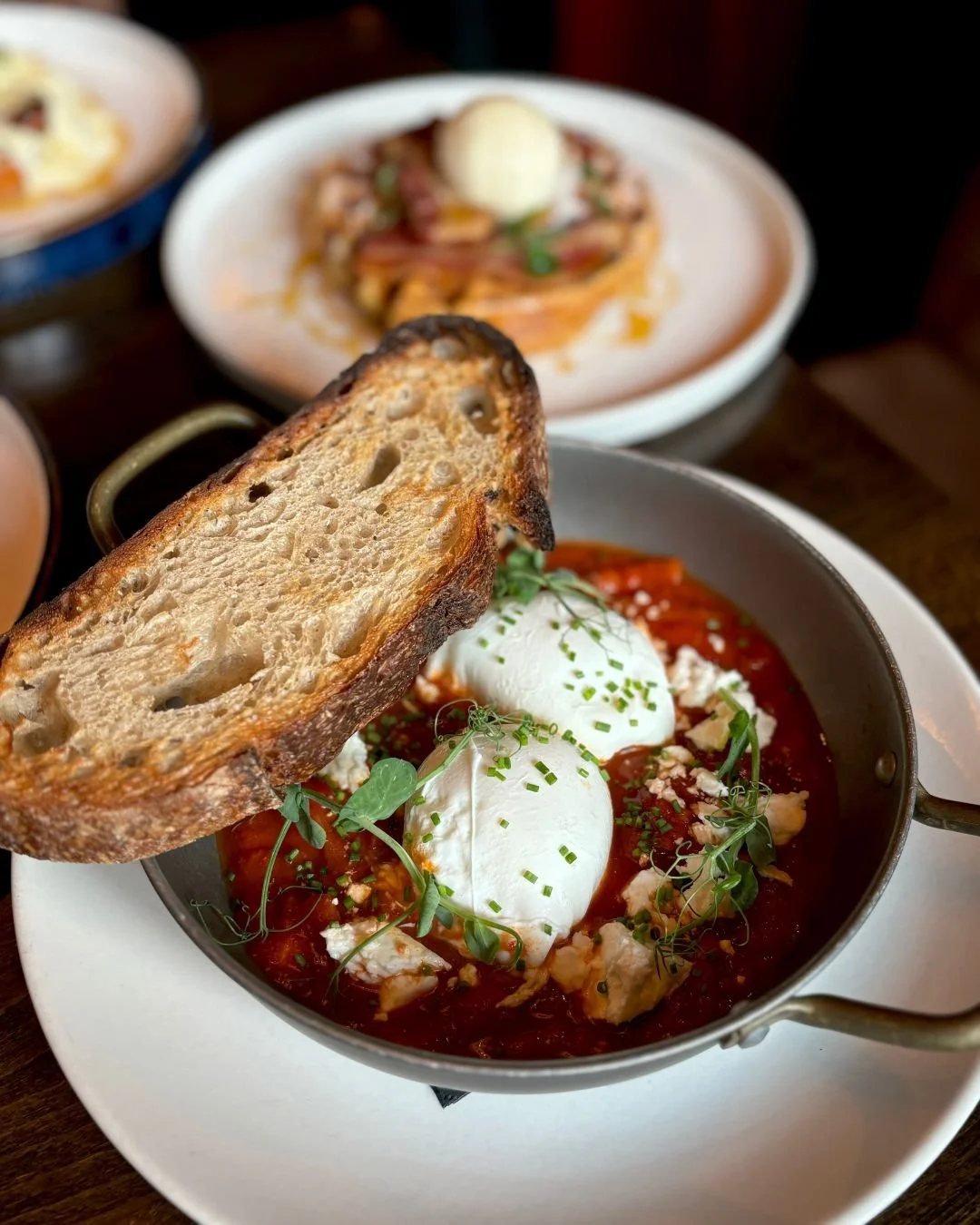 Shakshuka eggs 2 eggs poached in a lightly spiced tomato ragu, served with Hugo’s sourdough toast Add a choice of chorizo OR feta for €2 extra