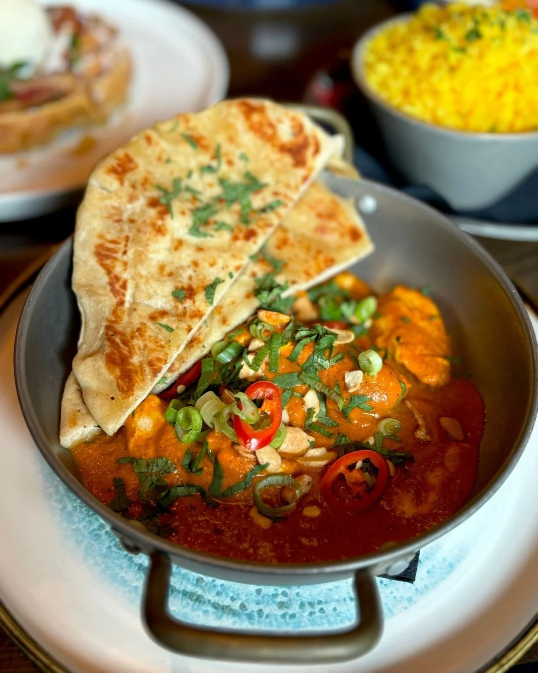 Butter chicken Cooked in our own blend of spices, tomato, greek yoghurt cashew nuts, served with homemade chipati bread and basmati rice