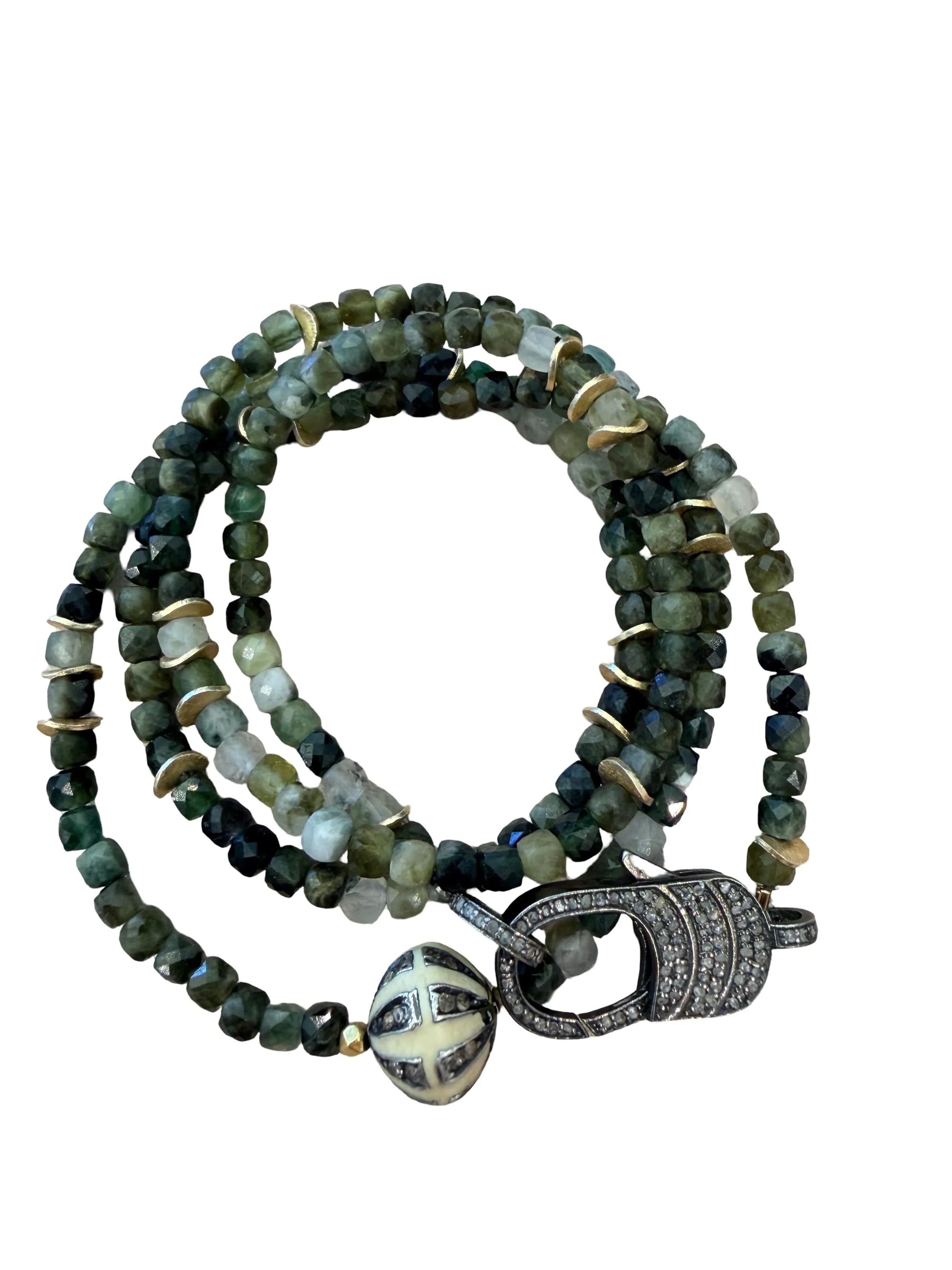 Green Tourmaline 18 karat gold wrap bracelet with pave diamond clasp featuring a vintage inspired diamond bead.