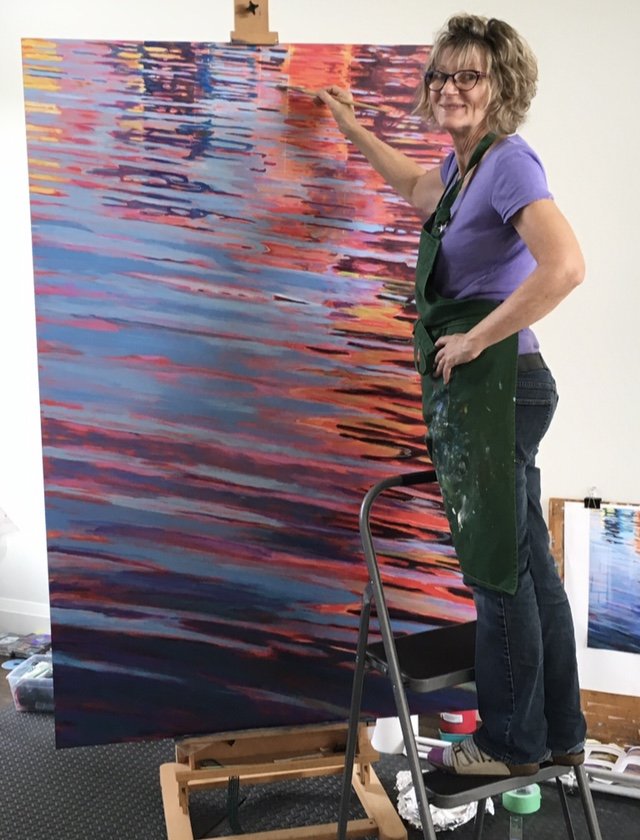 Jane painting at her easel 3.jpeg