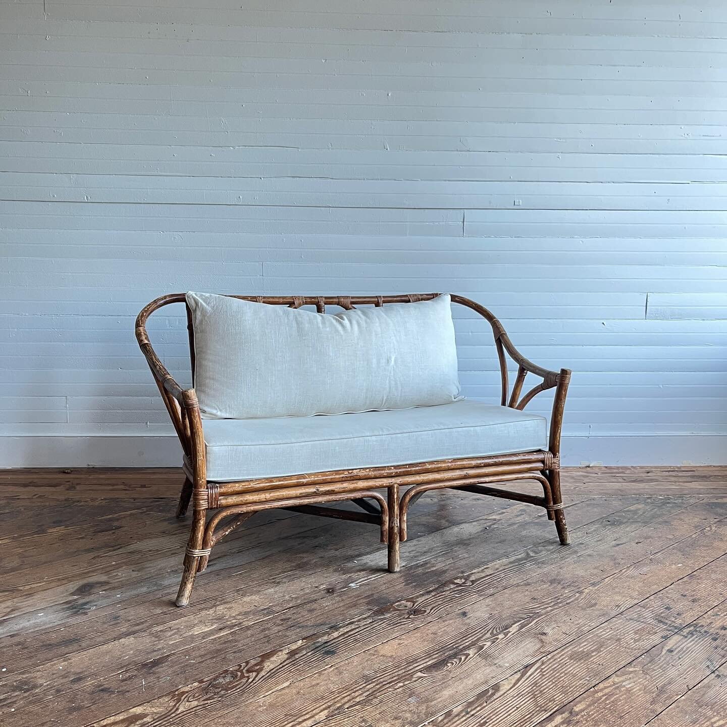 Vintage bamboo loveseat with linen upholstered pillows.  Good condition, wear to finish of frame.

30.5&rdquo;T x 51&rdquo;W x 27.5&rdquo;D

$395