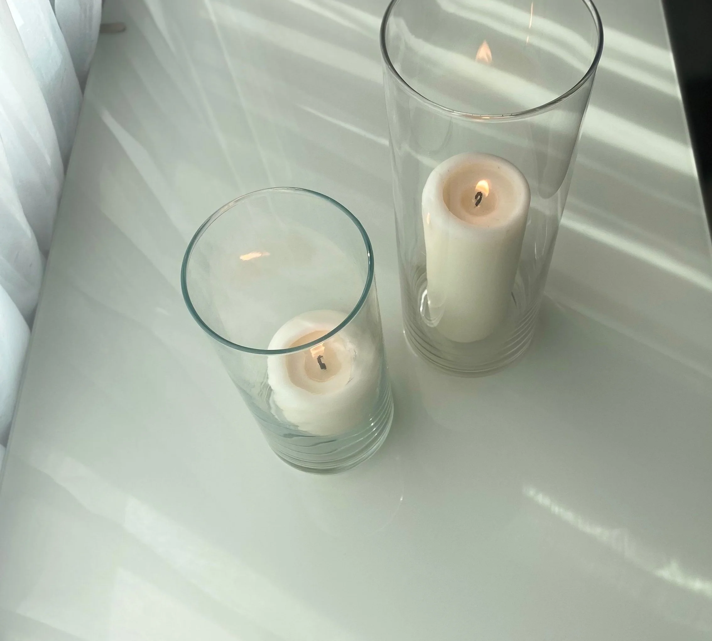 Glass cylinder candle holder/vase 
Quantity: 40x 7.25" | 14x 10" + more sizes available 
50¢-75¢ each