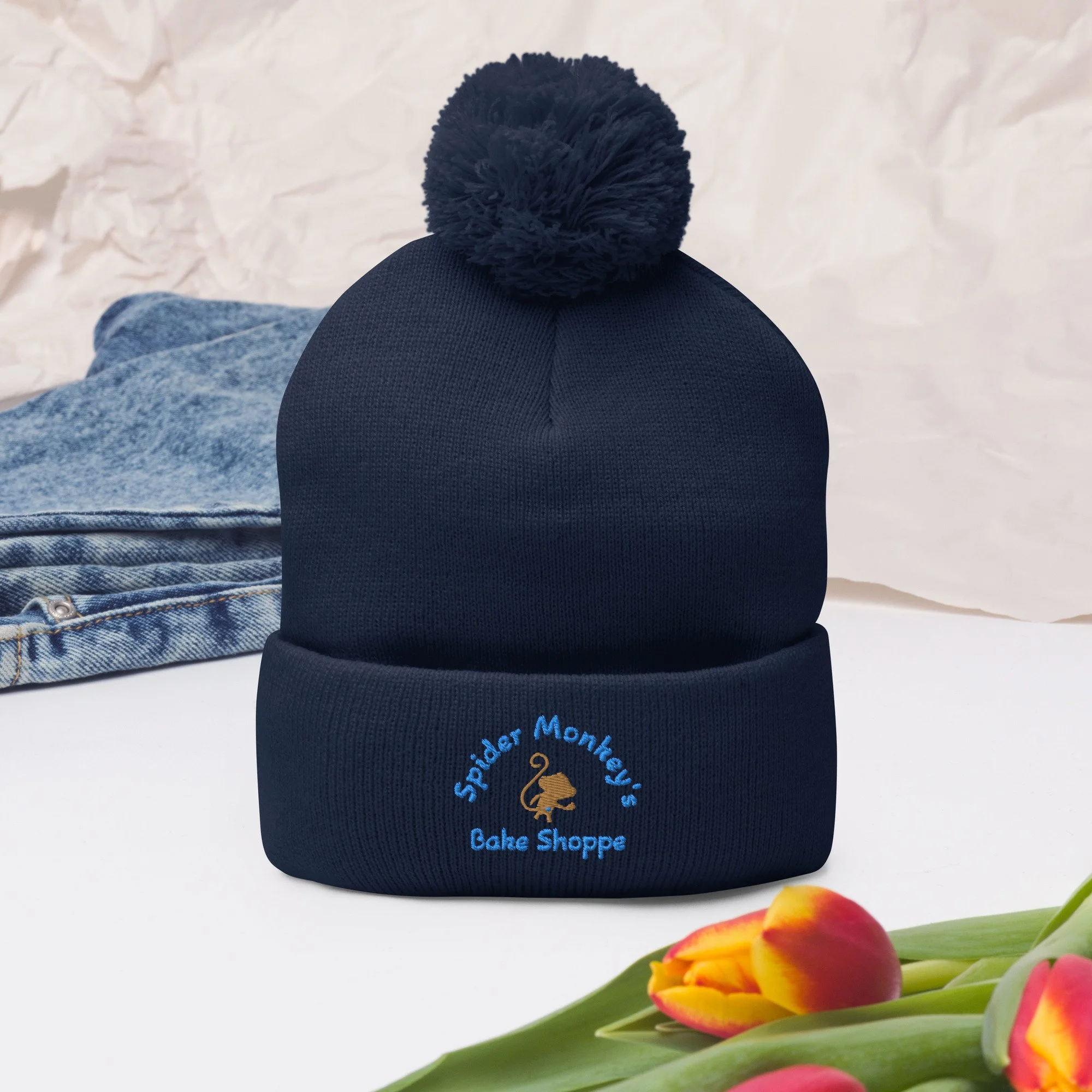 pom-pom-knit-cap-navy-front-2-641f4927ae5dd.jpg