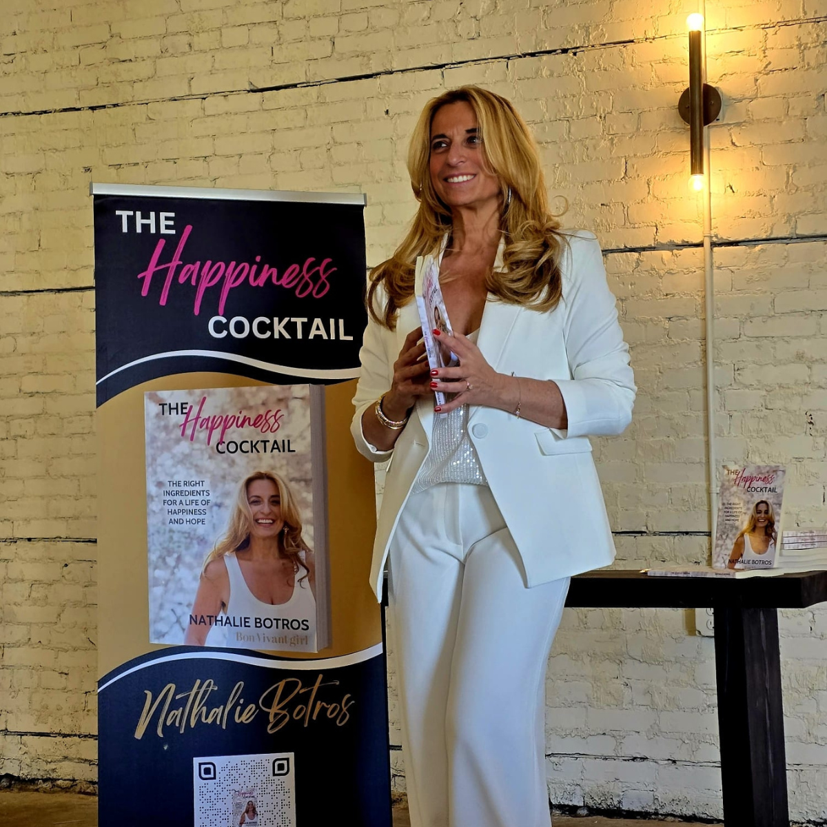 Nathalie Botros at a book signing for The Happiness Cocktail.