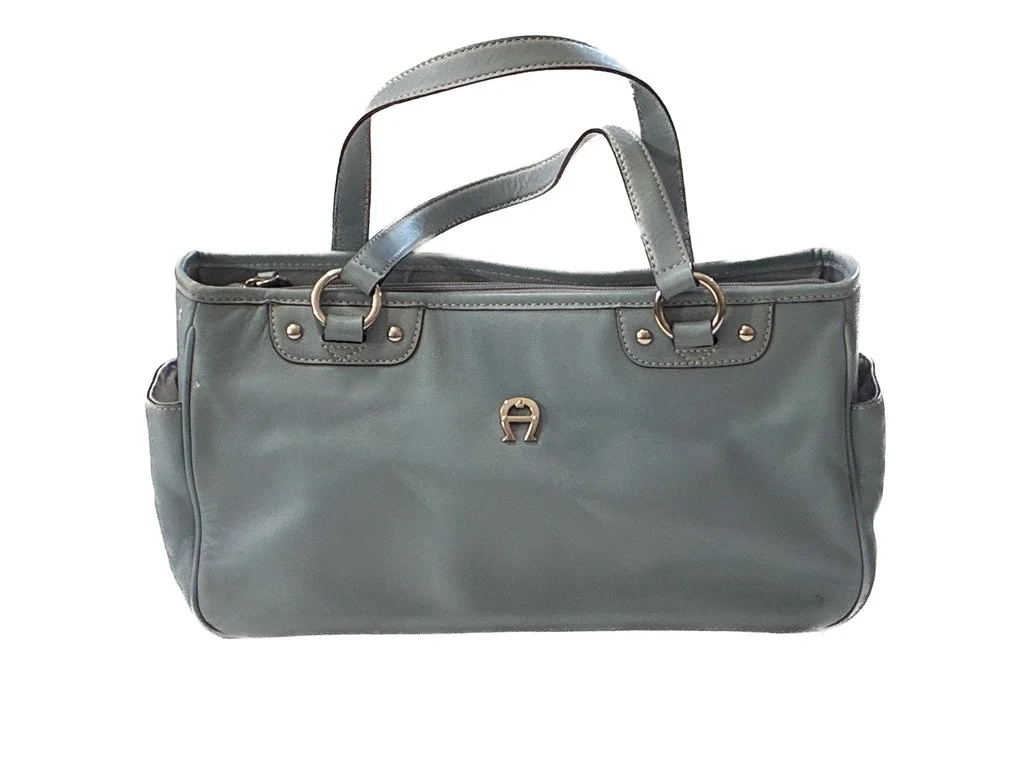 Front of Powder Blue Shoulder bag by Etienne Aigner.  Photography and styling by David Braselton for gr8bag.com
