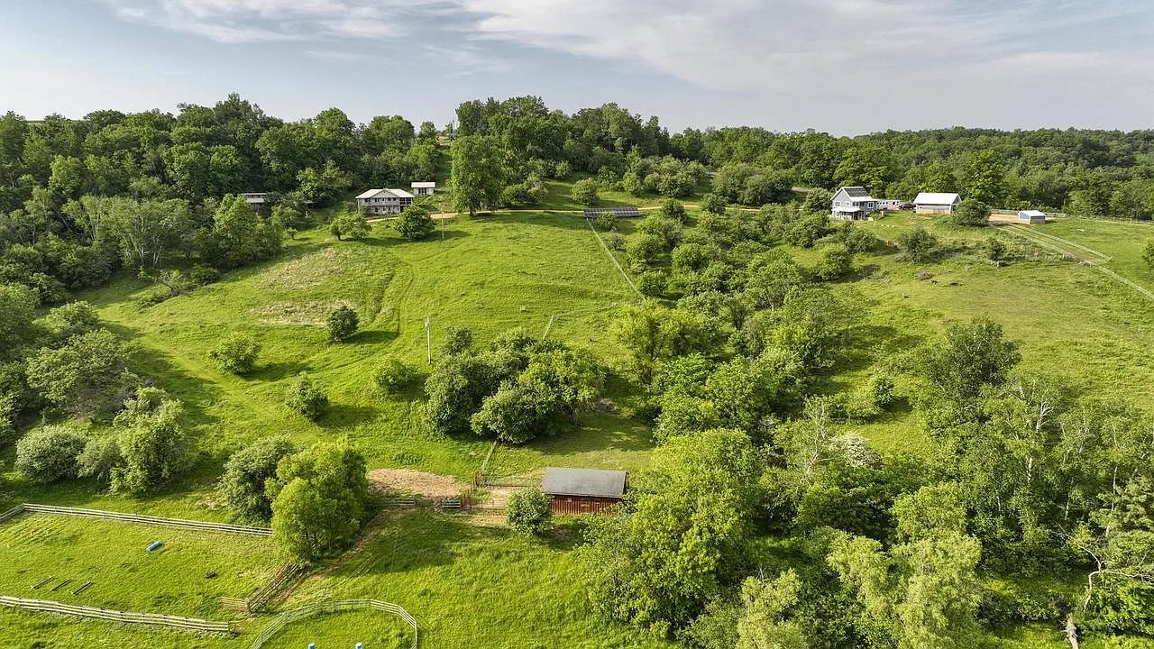 For Sale in Wisconsin: Tucked within 68 acres of diverse ecosystems, this rare property offers three residences designed for retreat, reflection, and regeneration. Whether you're dreaming of a multi-family homestead, B&amp;B, or private sanctuary, th