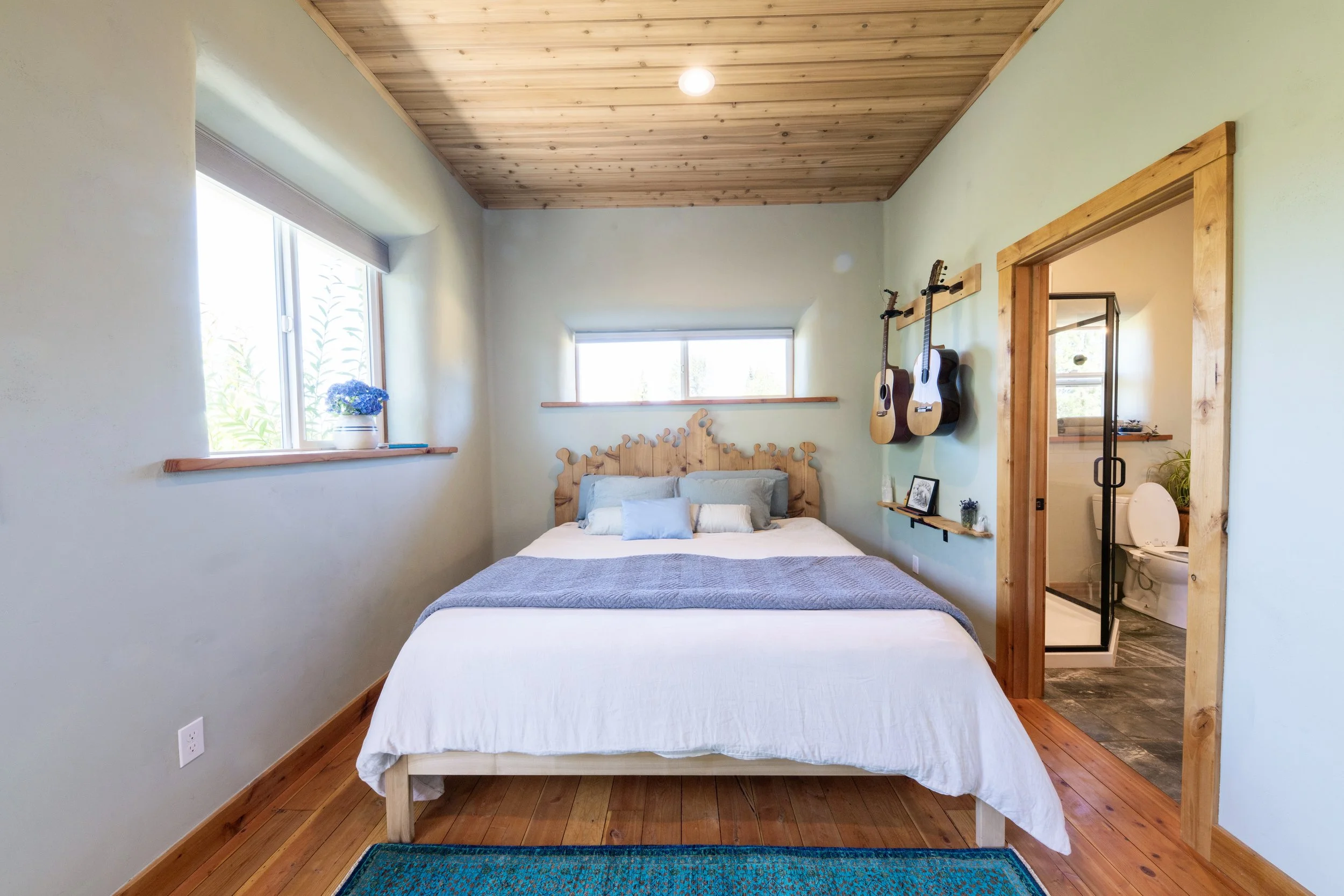 be-easy-farm-primary-bedroom-straw-bale-home-sequim-wa.jpg