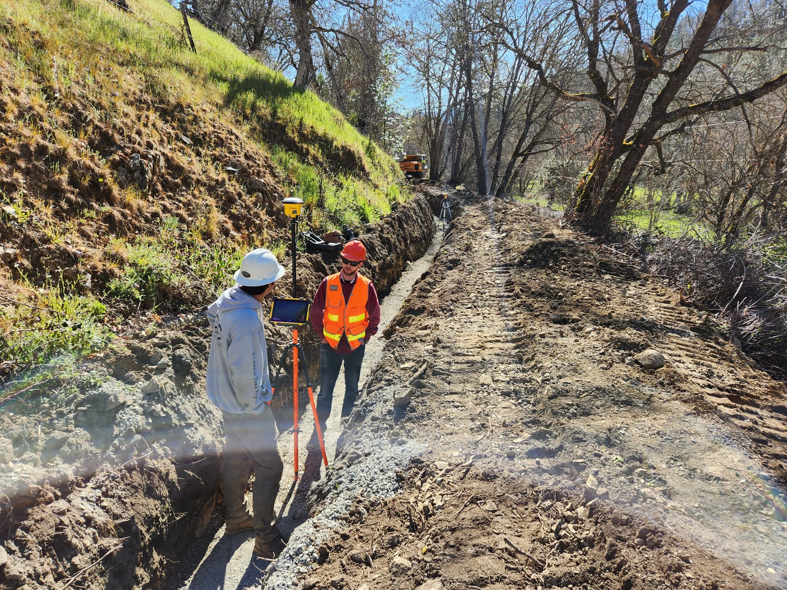 Surveying the ditch for Upper Phillips Irrigation Efficiency Project