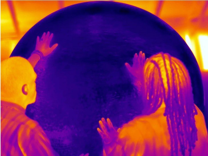 Mikael and Marques with sun disk.jpg