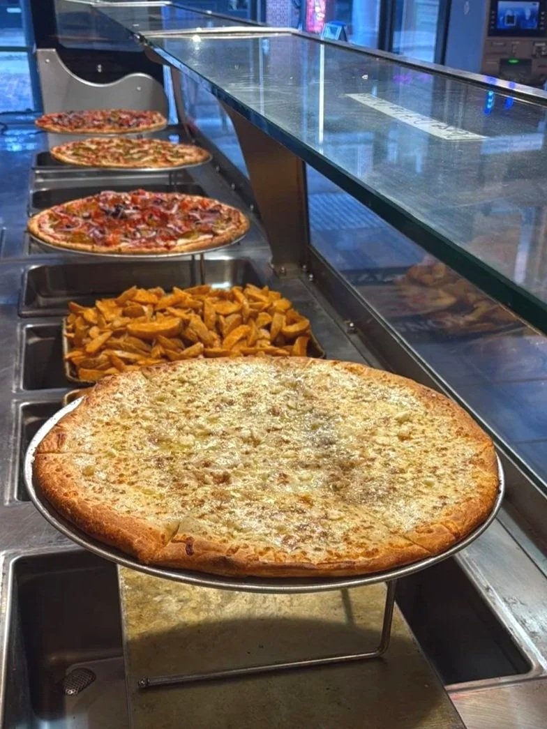Cheese Pizza by the Slice, Fries, and Various Pizza Flavors at Monster Pizza in downtown Ybor City