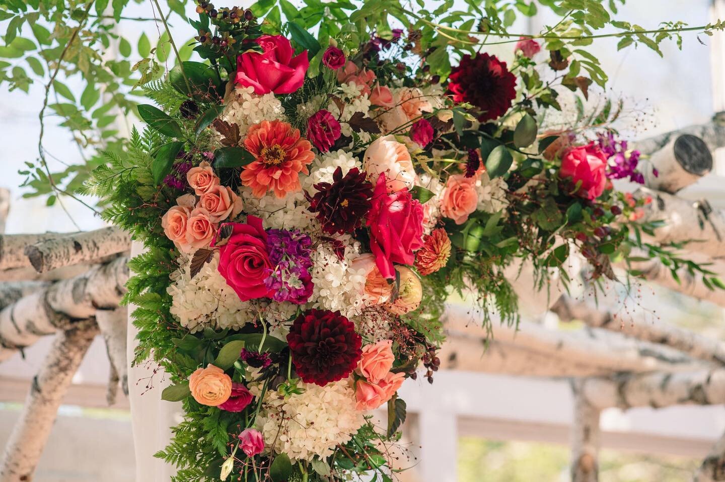 When Rachel came to us with her ideas for her color scheme we were so excited. Her late summer wedding was a perfect combination of bright pinks and summer hues with accents of moodier, warm fall tones. @lakesregionfloral absolutely killed it! 

Phot