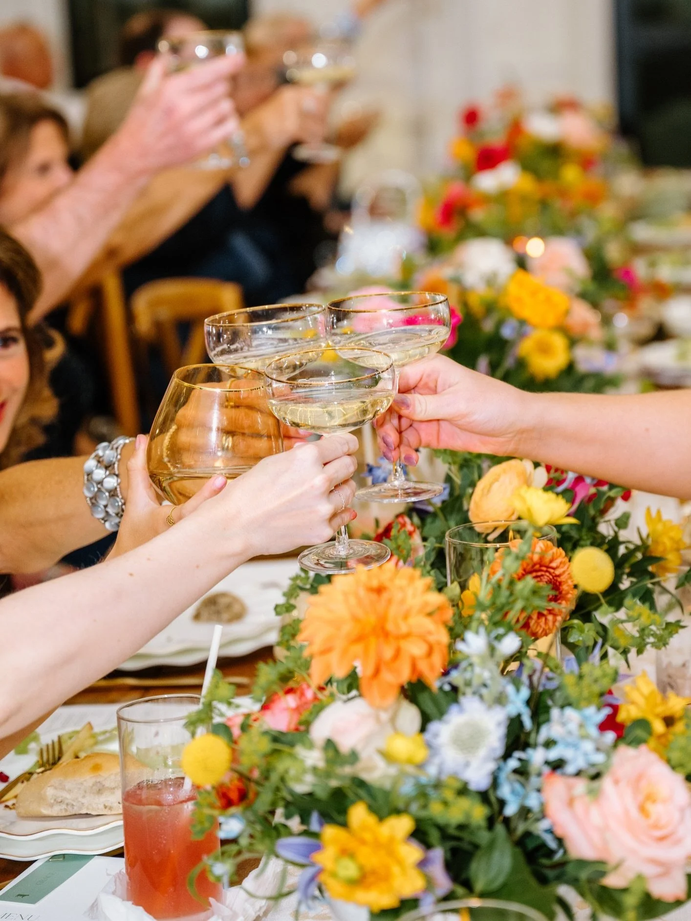 Intentional design starts with a clear direction. For this wedding, we carried a warm palette of pinks, oranges, and yellows from the ceremony aisle straight into the reception tables.   But beautiful design only lands when the logistics are structur
