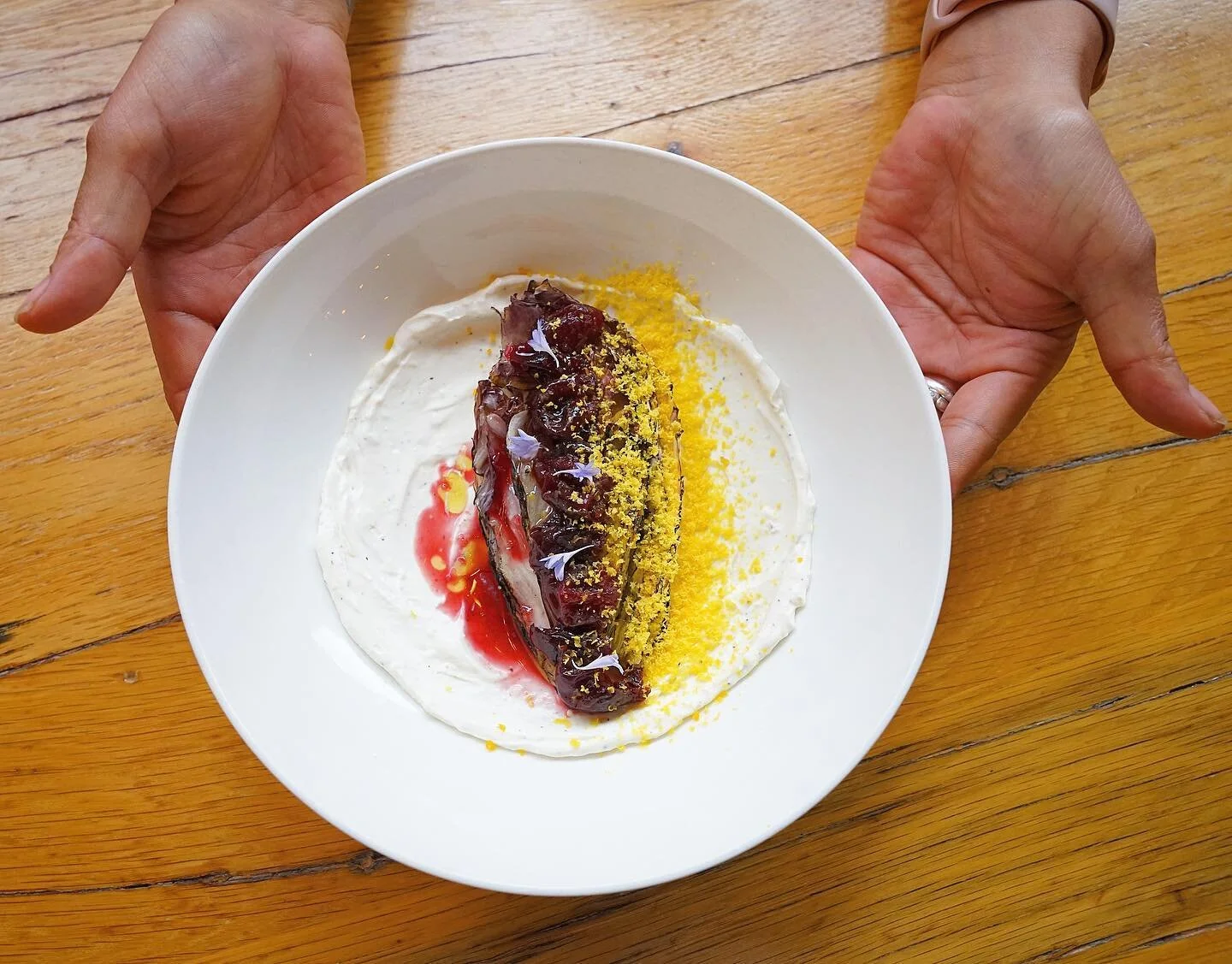 Cool dishes for hot days; that&rsquo;s how our kitchen is combating this insane heat wave. Introducing Chef @acleverbastard&rsquo;s latest creation: Charred Radicchio with house made ricotta, pickled cherries, cured egg + olive oil. #summereats